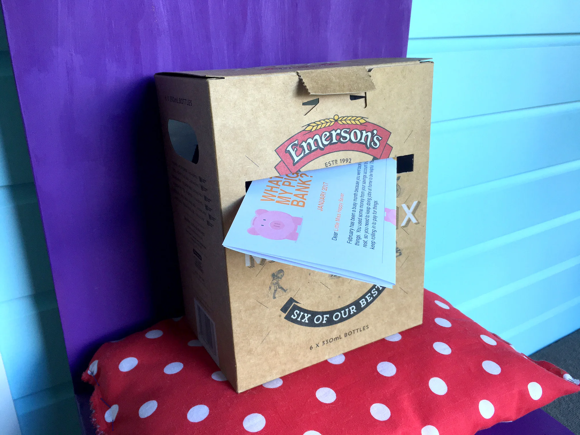 Little Miss Happy Saver letterbox outside her room.