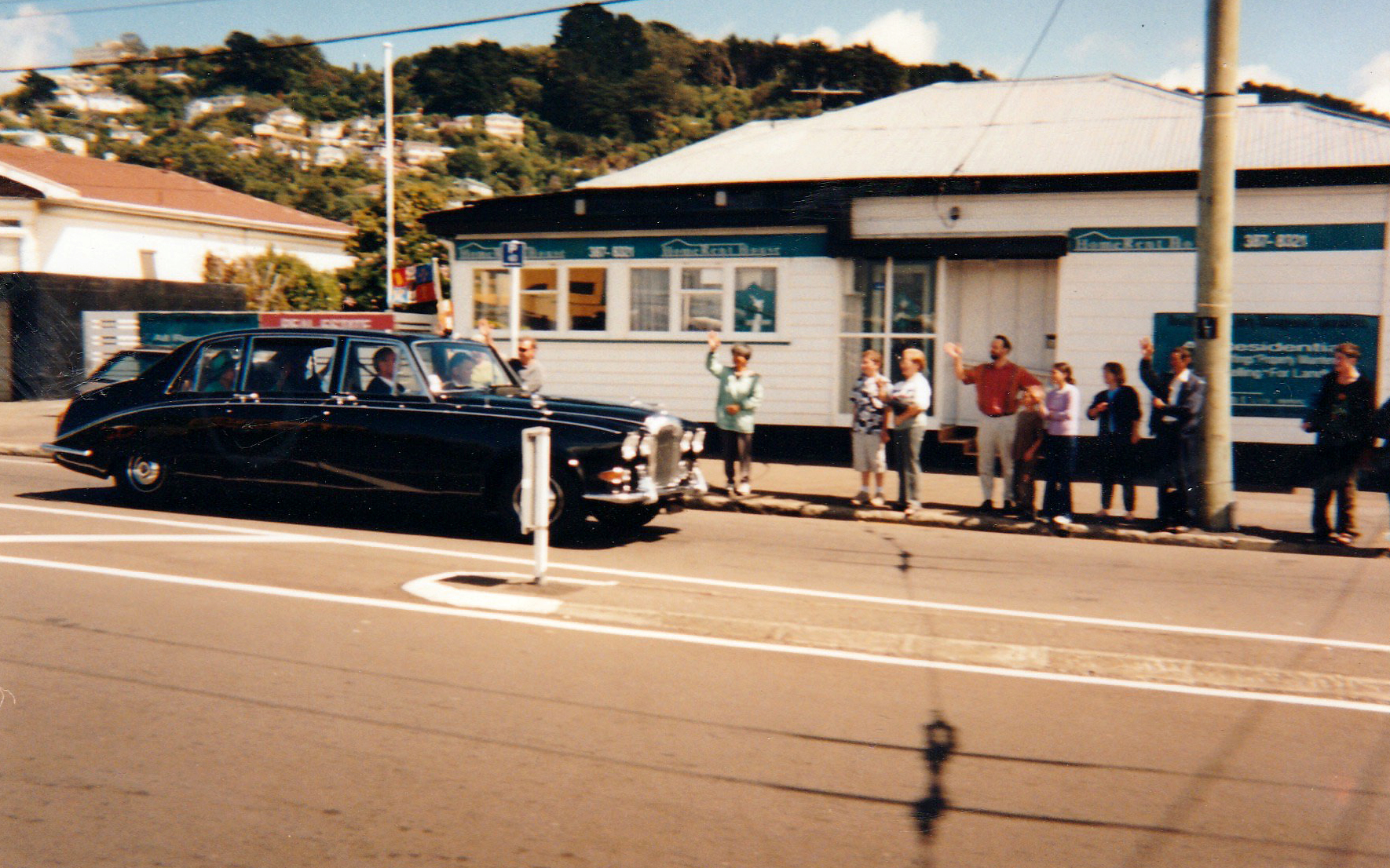 The Queen driving past Kilbirnie Pak N Save