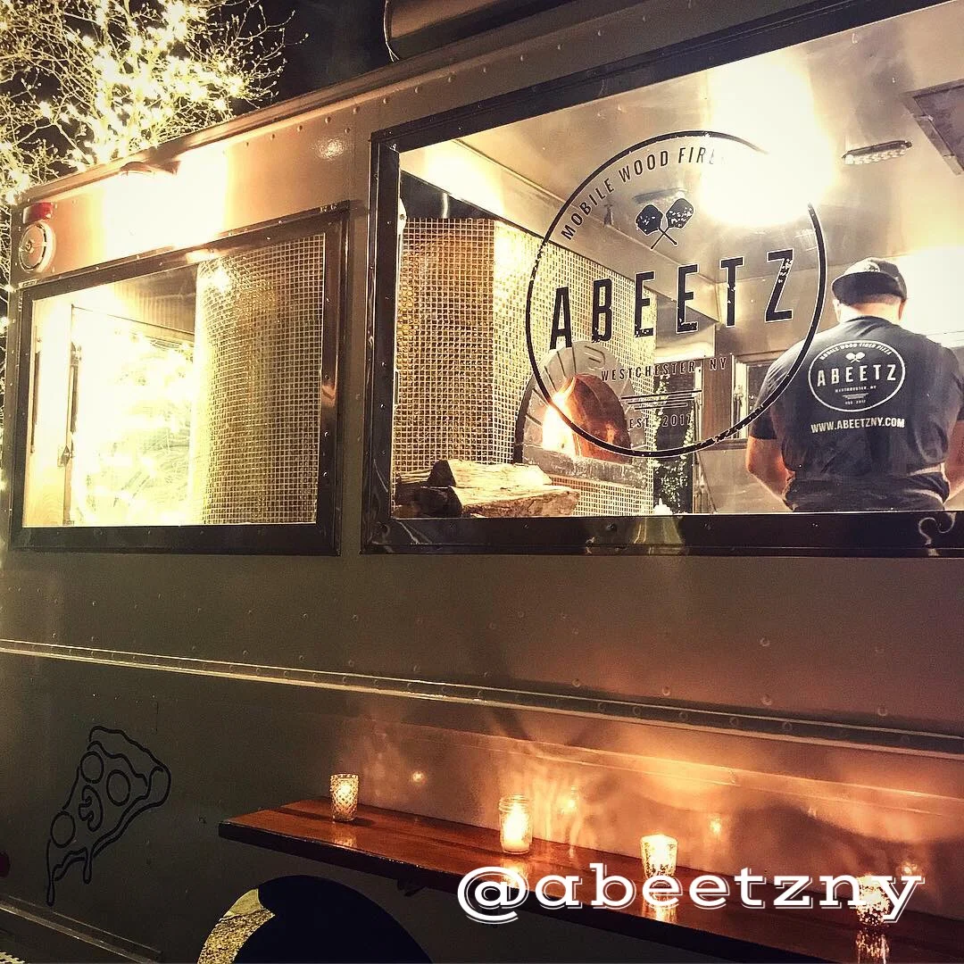 ABEETZ - WOOD-FIRED PIZZA Making pizza as authentic as authentic can get, Abeetz pizza truck is our #1 pick when it comes to pizza. Founder David D'amico managed to bring together his passion for pizza and his family history to create one of the most successful food trucks in NYC. All you have to do now is to decide, whether you want to want to eat your pizza straight, folded, or use silverware :) Tip: Abeetz makes an Avocado Toast personal style pizza. Need we say more?