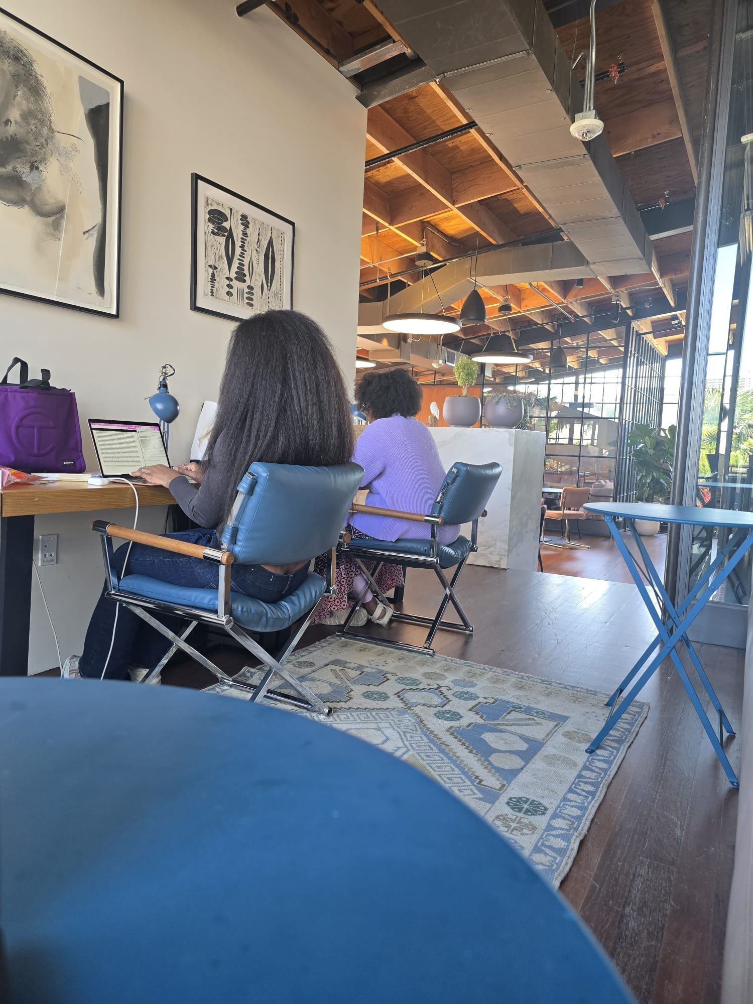 Black ASH Lab grad student research assistants writing in Culver City