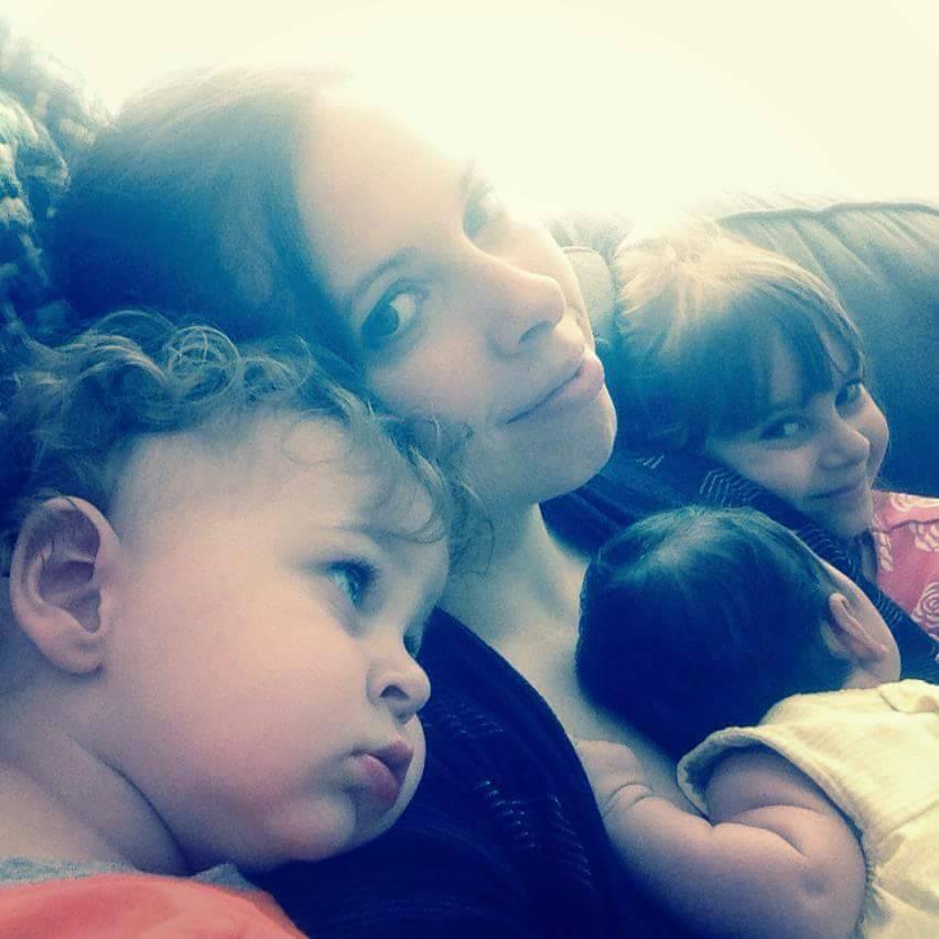 Mallory, a 28 year old mother with her three children