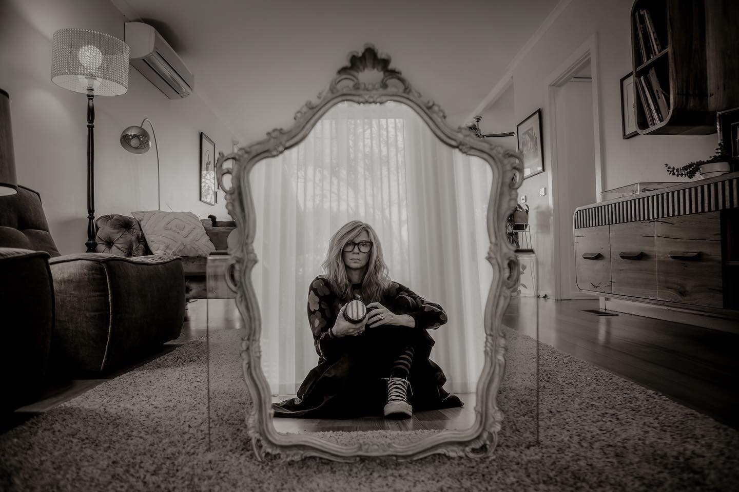 Me just playing with one of the many gold mirrors I have floating around!  Must have a thing for them 😉 #photographer #bandw #naturallightphotography #blackandwhite #selfie #athome #mellow #woman
