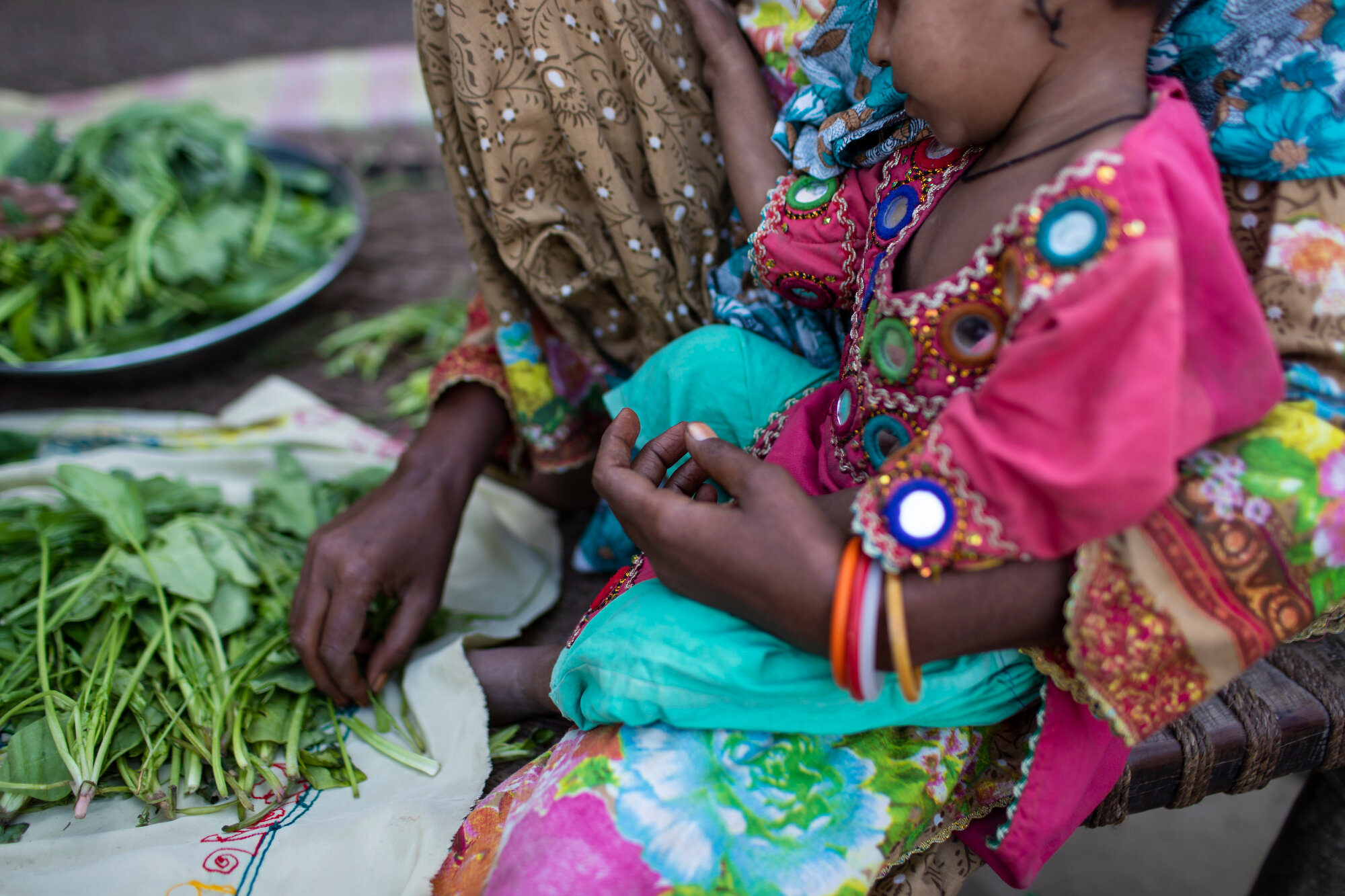  Heera Khatoon holds her daughter Farhana, 3, at her home in Allah Dino Seelro village near Rato Dero, Sindh. Both are HIV positive.  