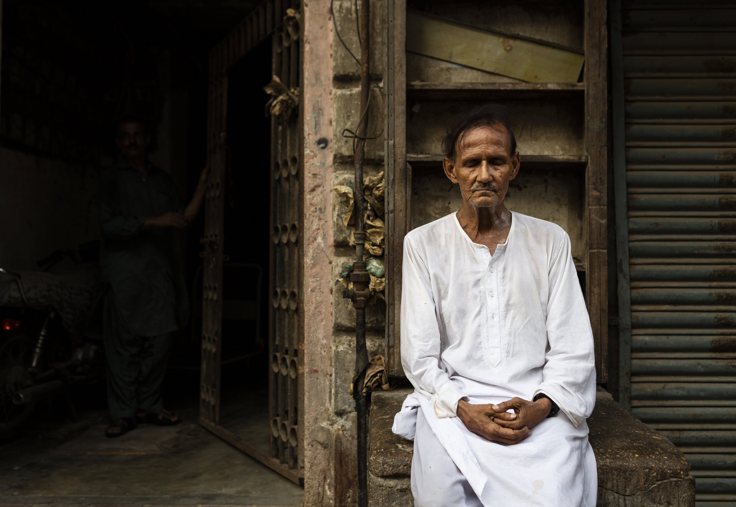  Portrait: Muhammad Jameel, 60, sits outside his apartment in Karachi, Pakistan on June 2, 2019. Jameel has been a long time resident of the 'Burns Rd' area and attests that 'people from all over come to enjoy the variety of delicious foods.'Built by