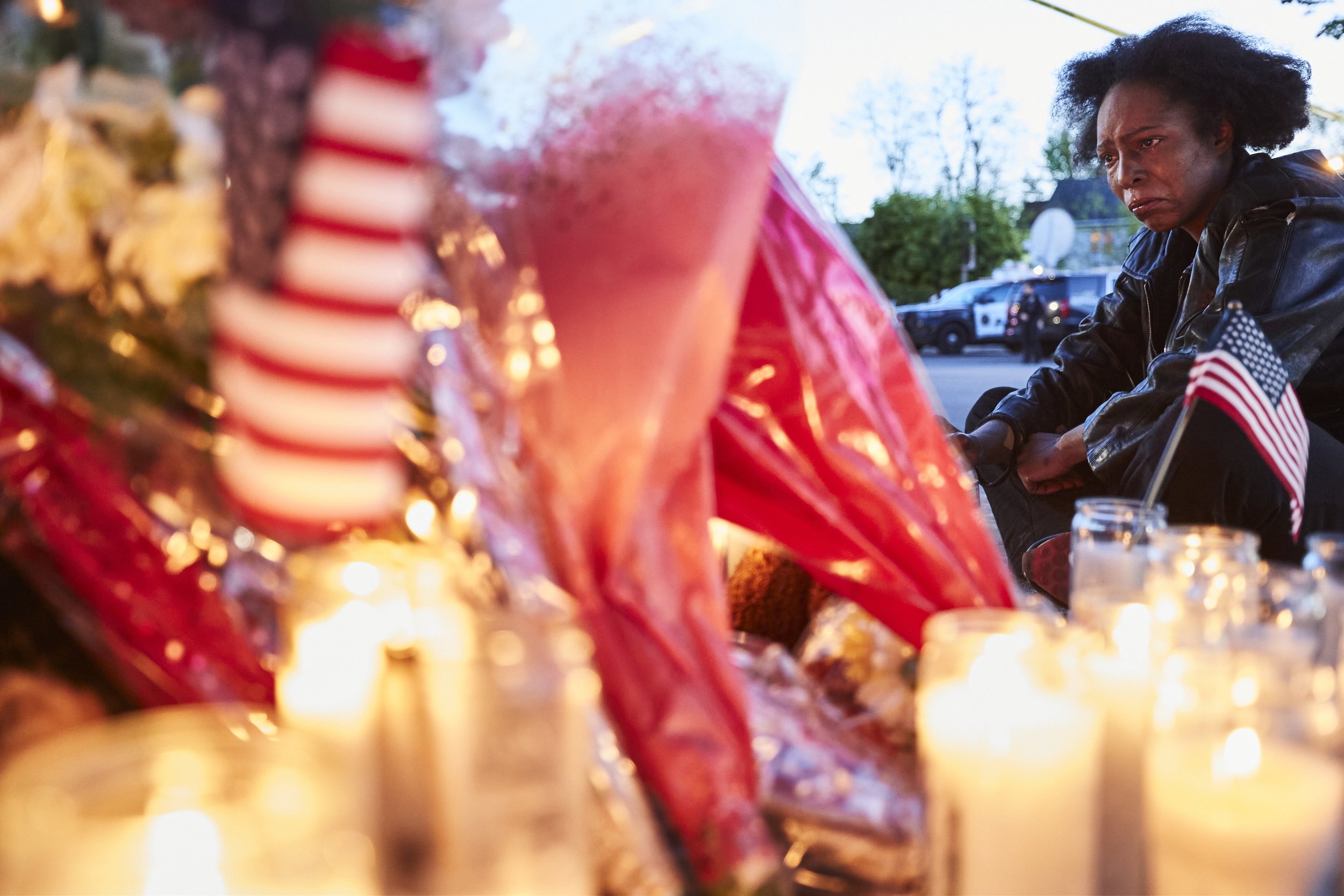   Kicia “Cold Spring’ mourns in front of the victims memorial by Tops. She cried out, “ It’s never gonna stop, it’s never ever gonna stop,” speaking about the numerous racially motivated killings and mass shootings that have taken place over the past