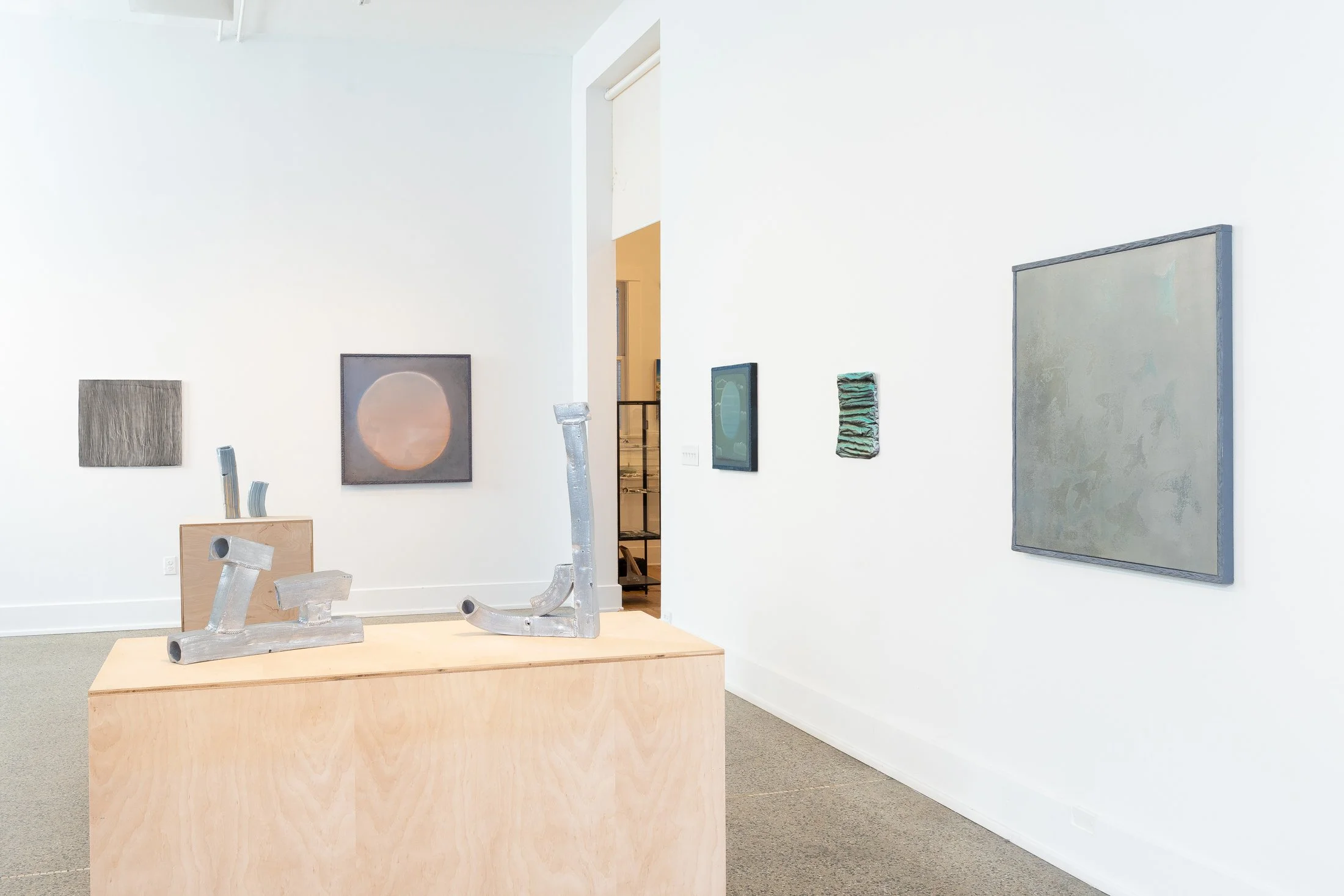   left:    Thumbs in the Fog I,  2025&nbsp;  ceramic, chrome wheel paint&nbsp;    right:   Thumbs in the Fog II,  2025&nbsp;  ceramic, chrome wheel paint&nbsp;   