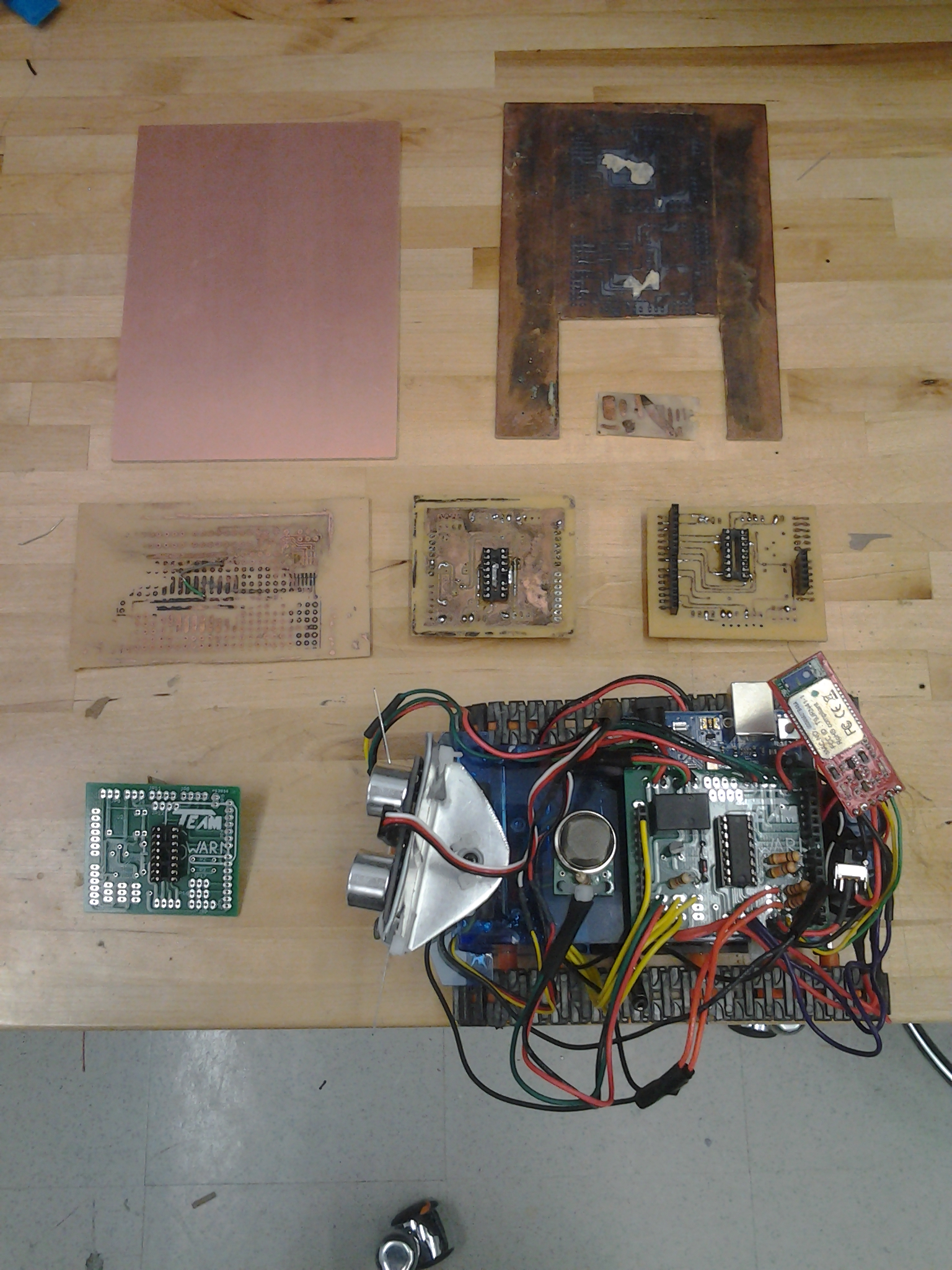 The hand etched PCB's that I made to verify the PCB design before sending it out to get fabbed. 
