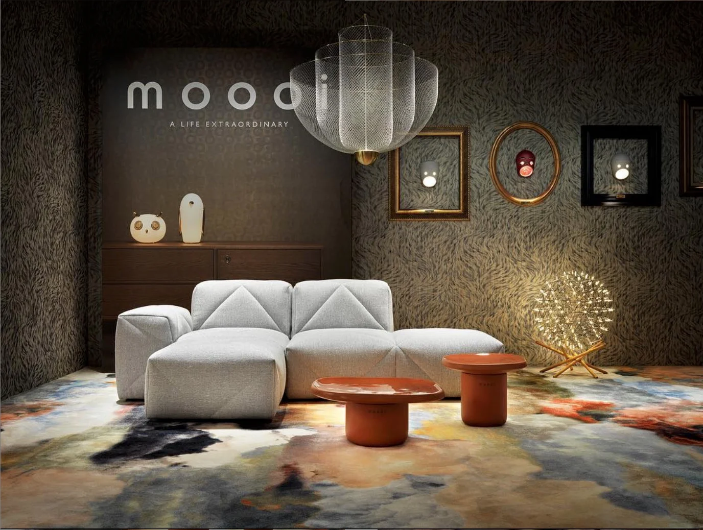 View of Moooi’s exhibit featuring (from top, clockwise:) Meshmatics Chandelier by Rick Tegelaar, The Party Wall Lamps by Kranen/Gille, Raimond floor lamp by Raimond Puts / Ox-ID, Obon tables by Simone Bonanni Obon, BFF Sofa by Marcel Wanders, Walking on Clouds carpet by Front for Moooi Carpets, and Uhuh and Noot Noot table lamps by Marcel Wanders