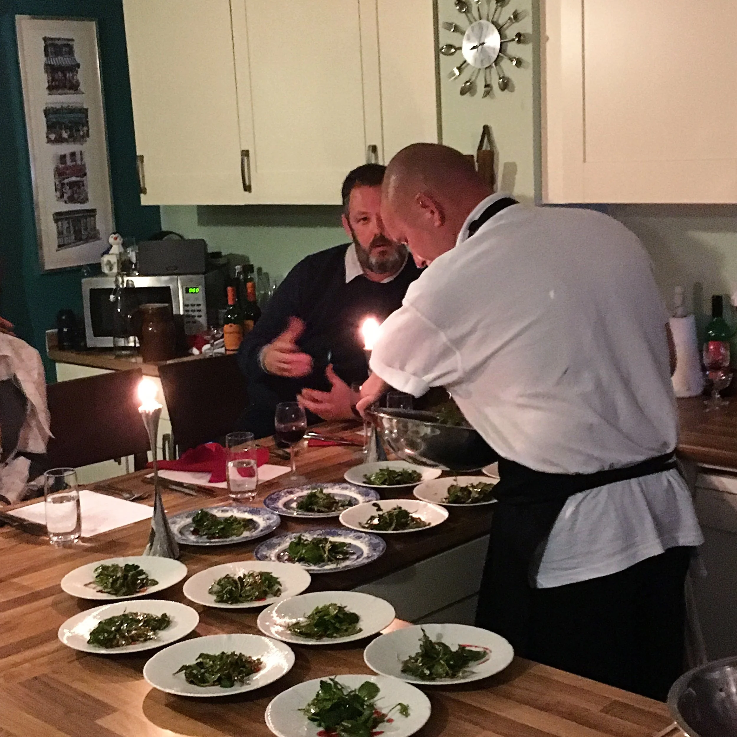 Ronnie plating a salad of pigeon, pickled elderberries and wet walnuts.