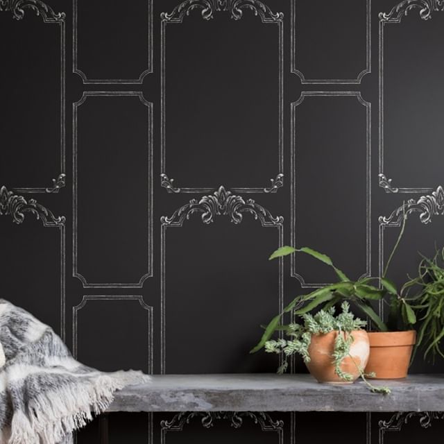 Give your entryway some haunted mansion vibes with a dark, vintage-inspired wallpaper like this one from Magnolia Home (@magnolia). Plus, you can scroll all sorts of spooky messages to your guests because this wall covering is made with real chalkboa