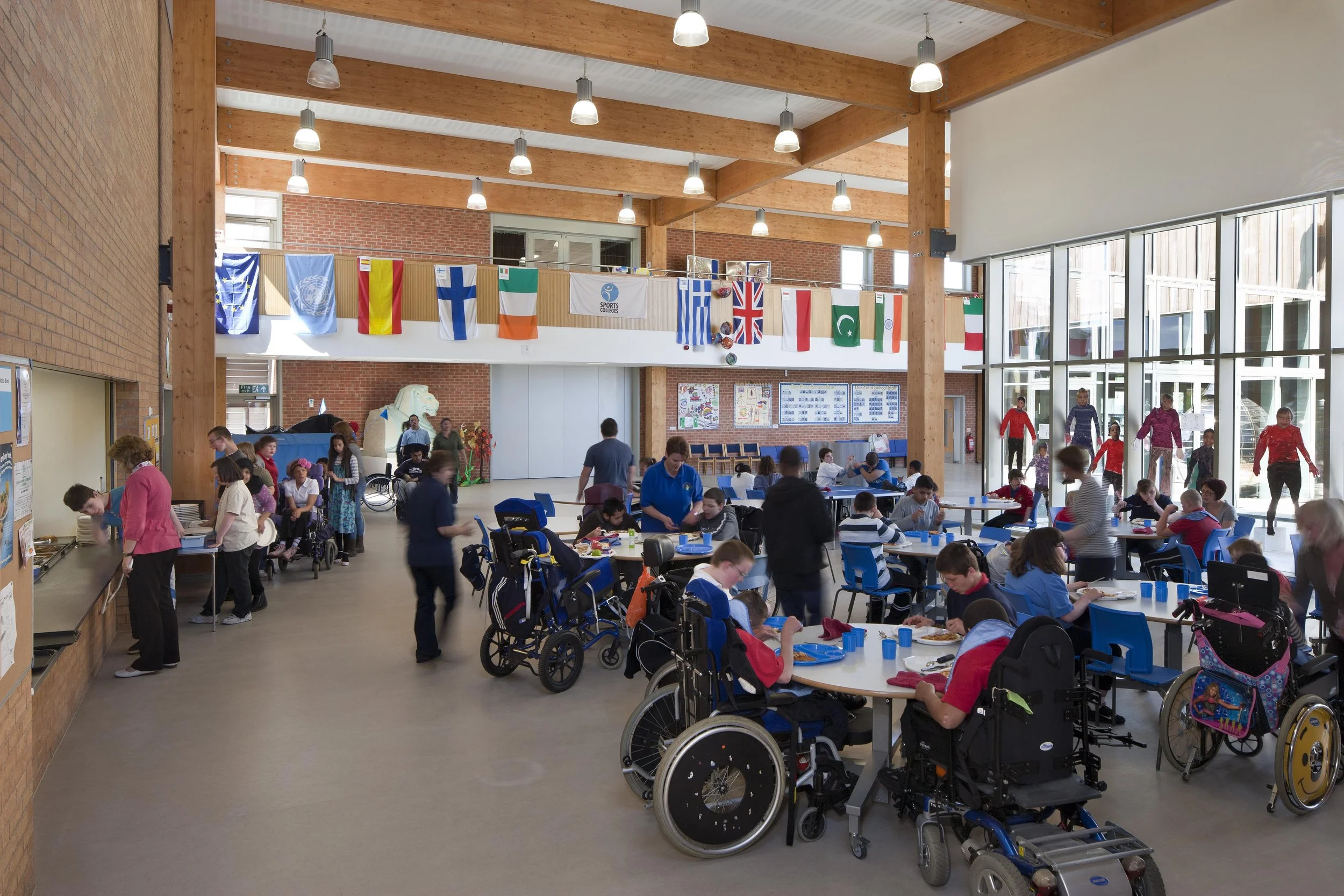 Dedicated 6th form center interior showing flexible work zones and modern loose seating arrangements.