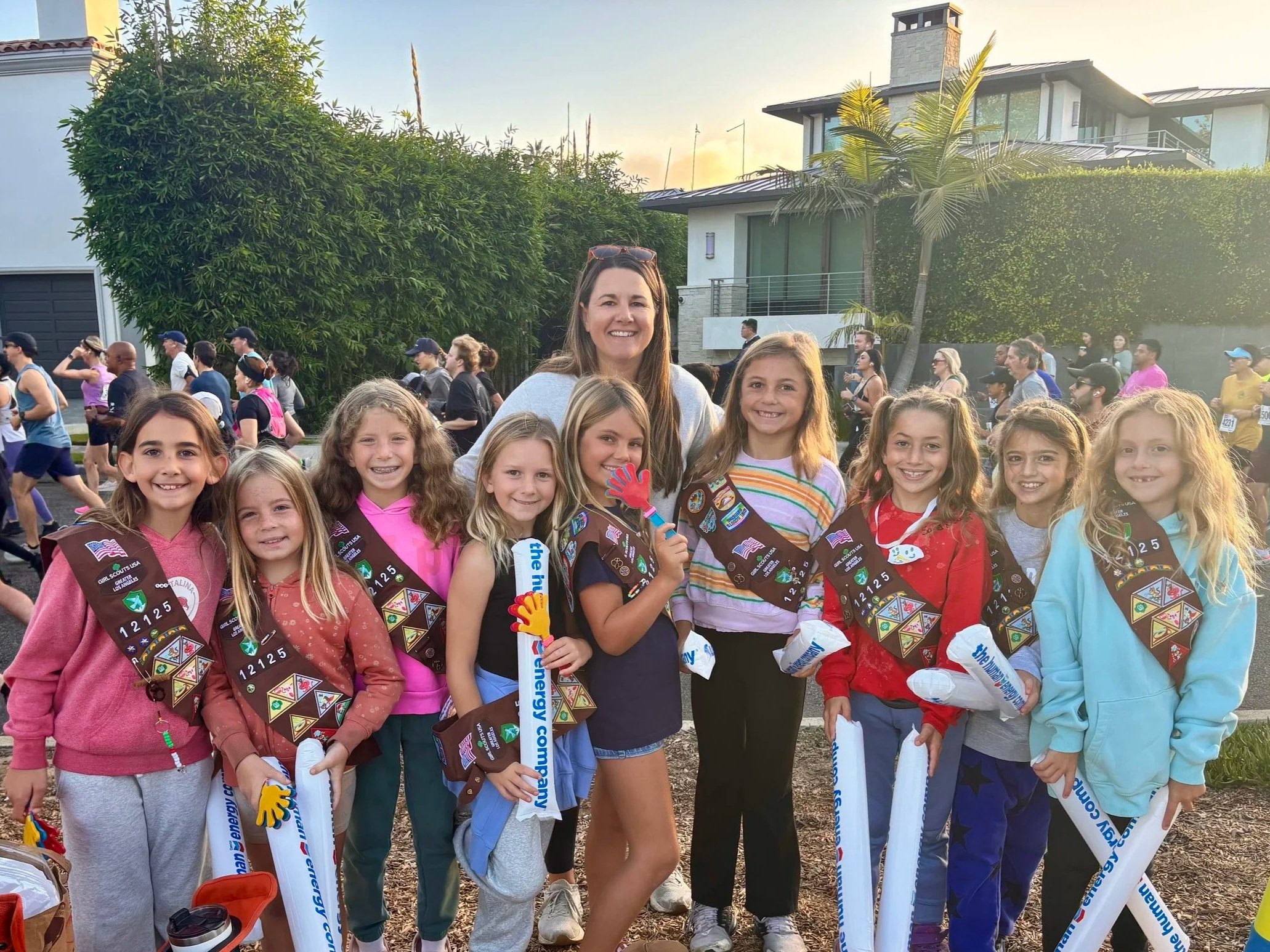 2025 Girl Scout Troops cheering on our racers.