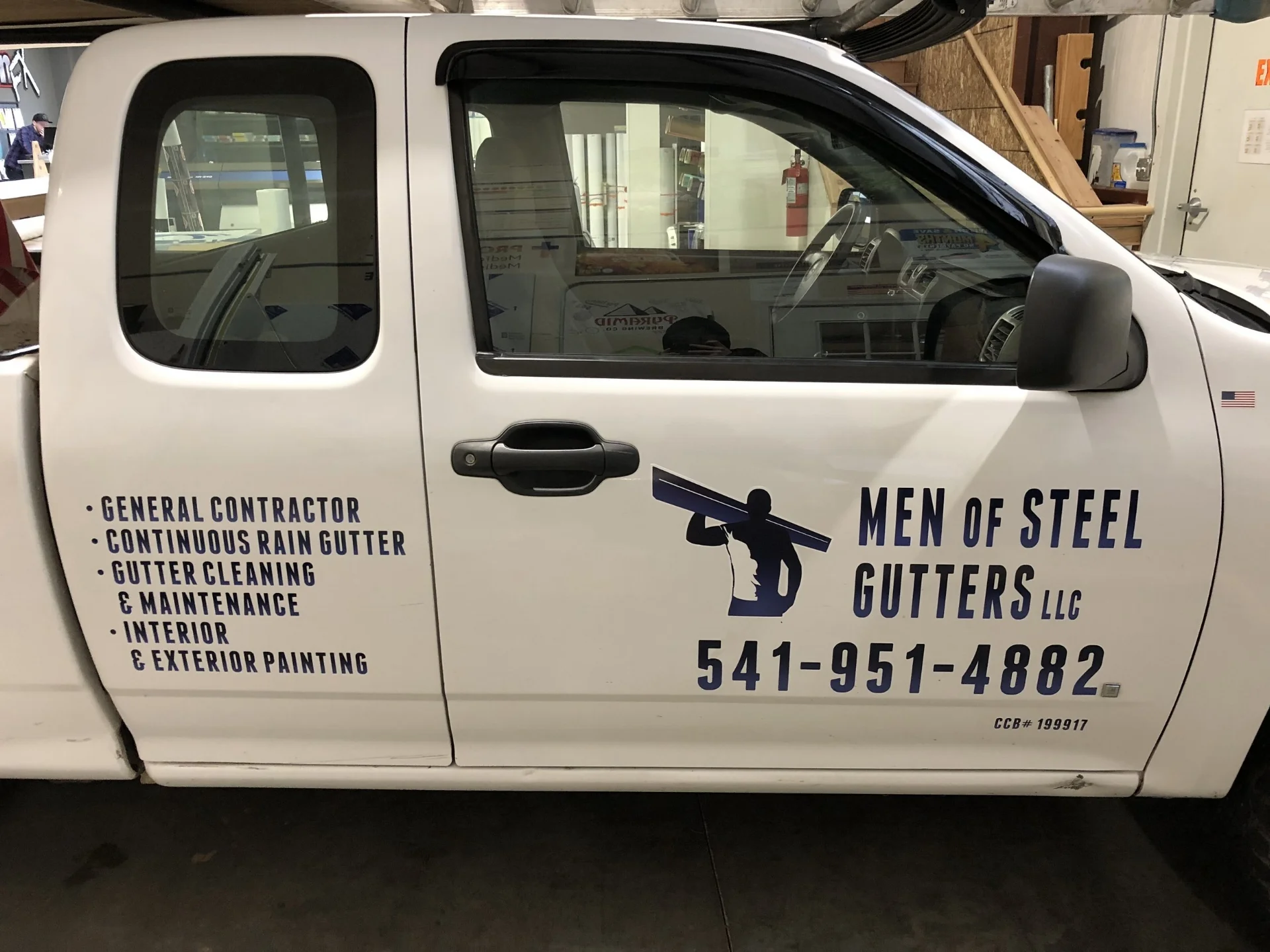Men of Steel Gutters Vehicle Graphics side 1
