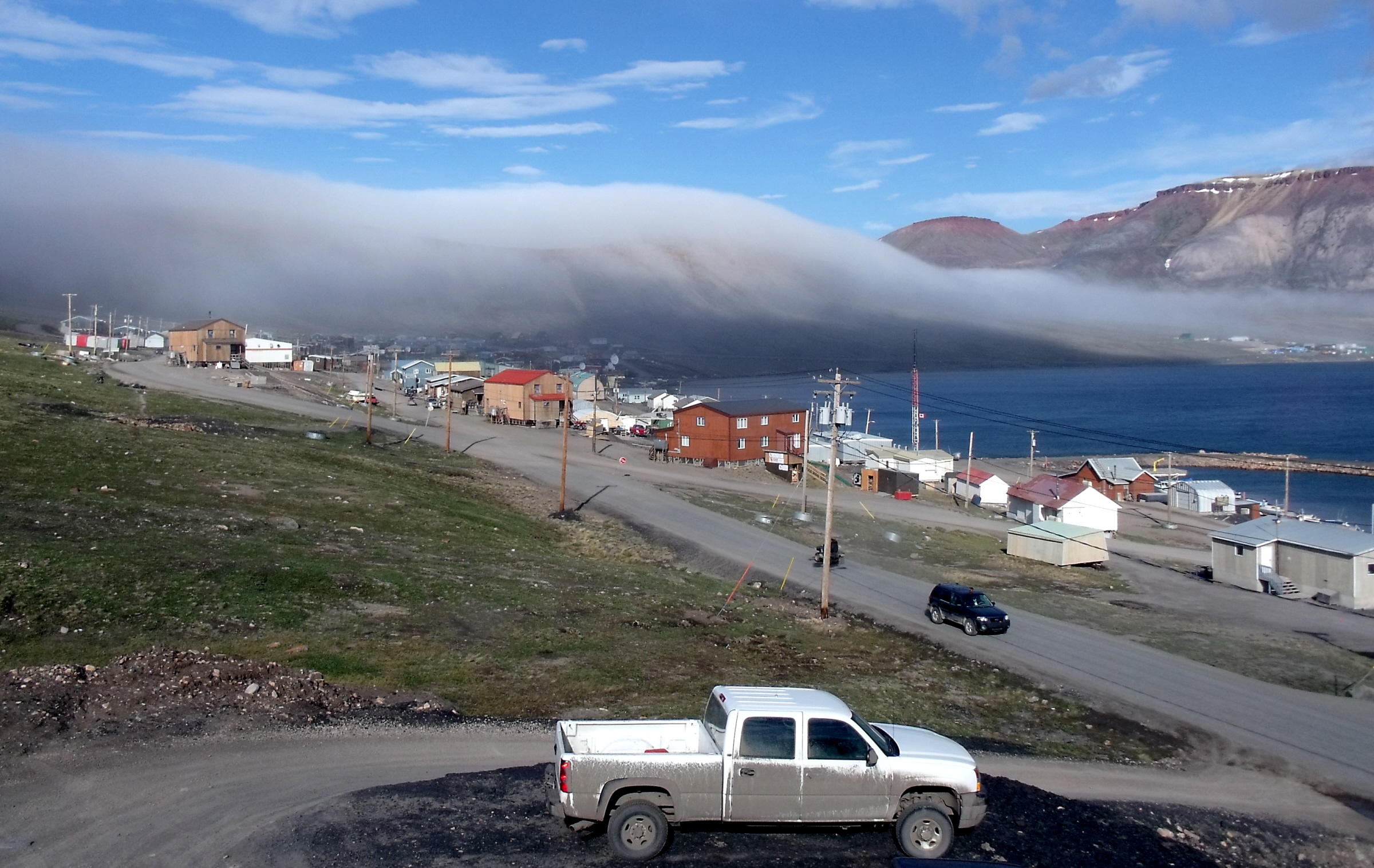  The fog rolling over hills in Nunavut By  Mike Beauregard   