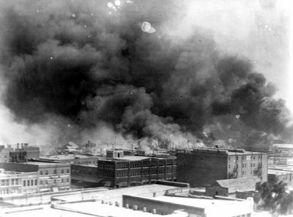  Smoke billowing over Tulsa, Oklahoma, during 1921 race riots  Photo by  Alvin C. Krupnick Co . 