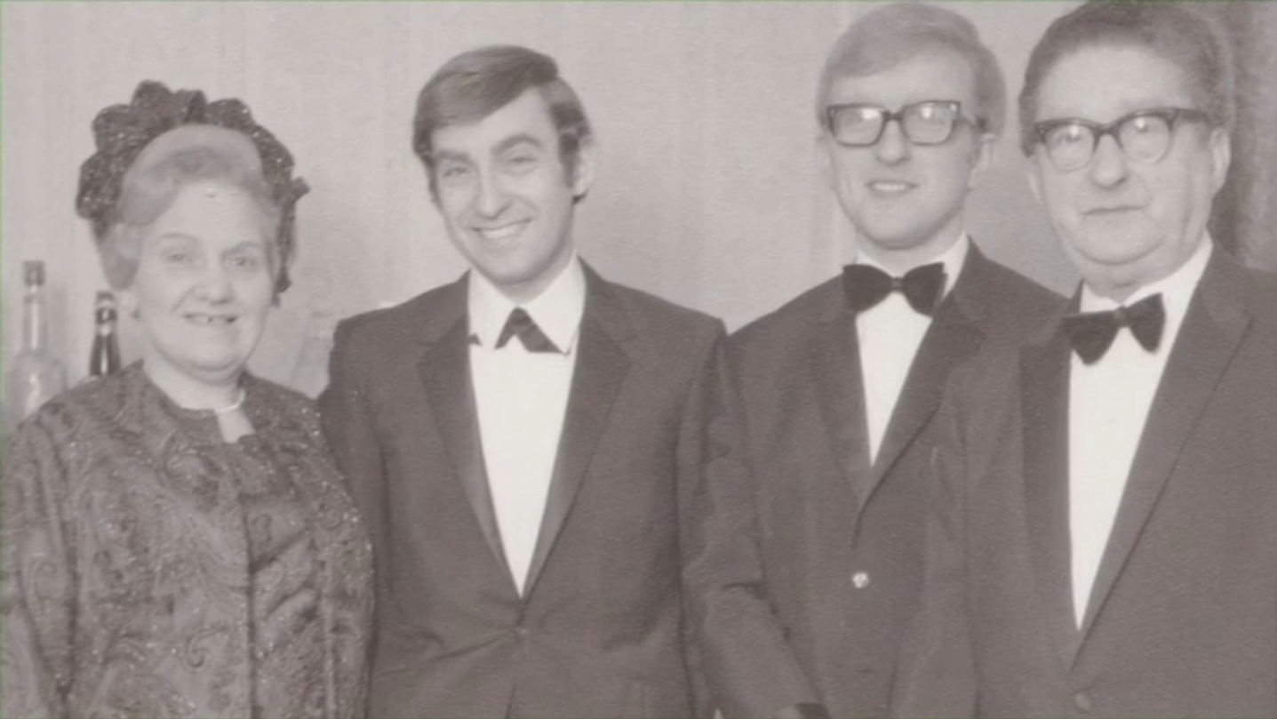 Colin, second from left, with his mother, brother and father