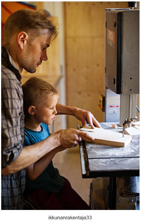  Juha working with his son 