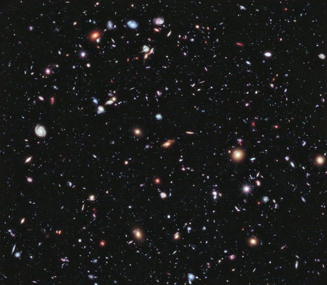 Like photographers assembling a portfolio of best shots, astronomers have assembled a new, improved portrait of mankind’s deepest-ever view of the universe. Called the eXtreme Deep Field, or XDF, the photo was assembled by combining 10 years of NASA Hubble Space Telescope photographs taken of a patch of sky at the center of the original Hubble Ultra Deep Field. The XDF is a small fraction of the angular diameter of the full Moon. The Hubble Ultra Deep Field is an image of a small area of space in the constellation Fornax, created using Hubble Space Telescope data from 2003 and 2004. By collecting faint light over many hours of observation, it revealed thousands of galaxies, both nearby and very distant, making it the deepest image of the universe ever taken at that time. The new full-color XDF image reaches much fainter galaxies, and includes very deep exposures in red light from Hubble’s new infrared camera, enabling new studies of the earliest galaxies in the universe. The XDF contains about 5,500 galaxies even within its smaller field of view. The faintest galaxies are one ten-billionth the brightness of what the human eye can see. Image Credit: NASA, ESA, G. Illingworth, D. Magee, and P. Oesch (University of California, Santa Cruz), R. Bouwens (Leiden University), and the HUDF09 Team