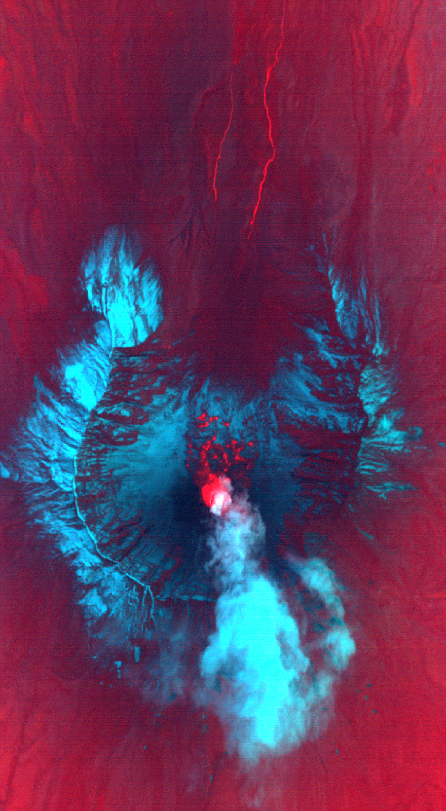 Hot lava had broken through the surface of the growing lava dome on Mount St. Helens when the MASTER sensor took this image in the early morning hours of October 13, 2004. An image composed of thermal infrared and visible light wavelengths reveals more details around the mountain. The volcanic plume is bright cyan, the cool crater is purple, and snow is light blue. To the north of the volcano, two bright red lines extend from south to north. These are warm-water streams, possibly heated by the active volcano. Image credit: Jeffrey Myers, NASA Ames Research Center