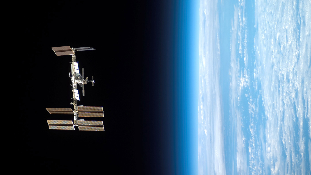 The International Space Station, in orbit around Earth. Image credit: Science@NASA and NASA’s Goddard Space Flight Center, International Space Station image courtesy of NASA