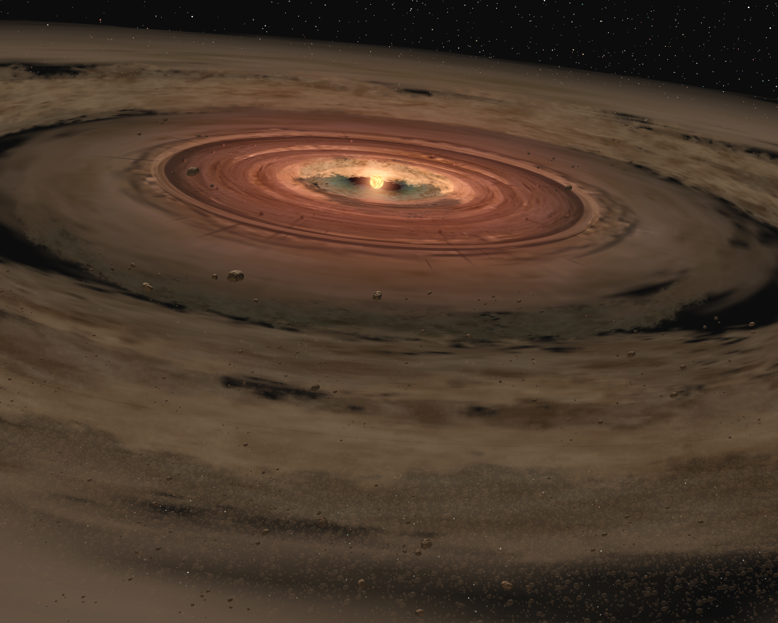 This artist's concept shows a very young star encircled by a disk of gas and dust, the raw materials from which rocky planets such as Earth are thought to form. Image Credit: NASA/JPL-Caltech