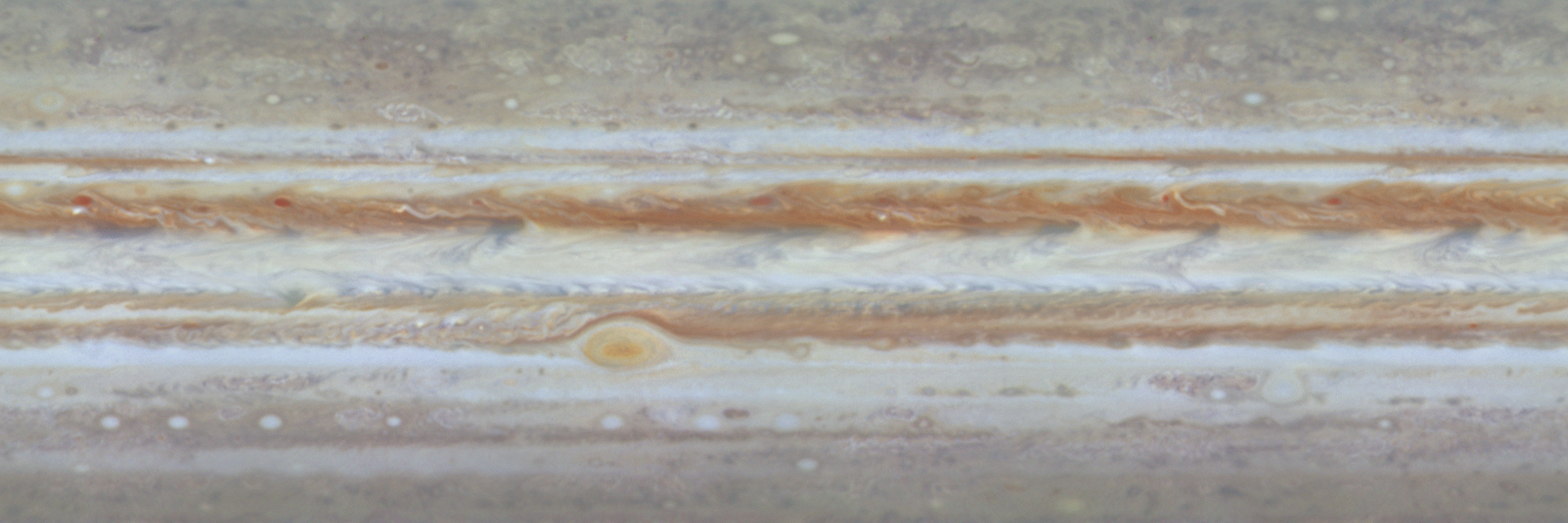The first color movie of Jupiter from NASA's Cassini spacecraft shows what it would look like to peel the entire globe of Jupiter, stretch it out on a wall into the form of a rectangular map, and watch its atmosphere evolve with time. The brief movie clip spans 24 Jupiter rotations between Oct. 31 and Nov. 9, 2000. Image credit: NASA/JPL/University of Arizona