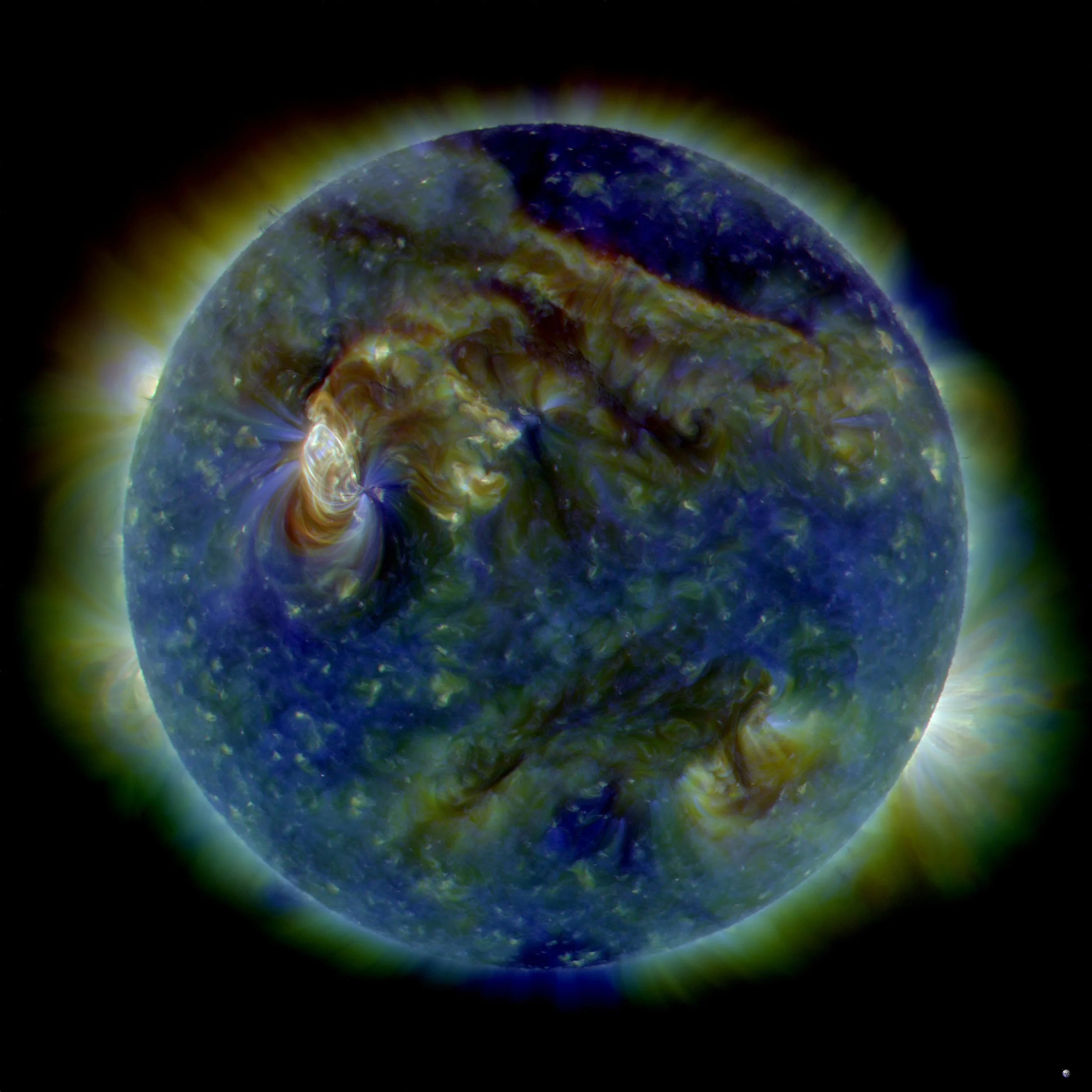 On August 1st, almost the entire Earth-facing side of the sun erupted in a tumult of activity. There was a C3-class solar flare (white area on upper left), a solar tsunami (wave-like structure, upper right), multiple filaments of magnetism lifting off the stellar surface, large-scale shaking of the solar corona, radio bursts, a coronal mass ejection and more. This multi-wavelength (211, 193 & 171 Angstrom) extreme ultraviolet snapshot from the Solar Dynamics Observatory (SDO) shows the sun's northern hemisphere in mid-eruption. Different colors in the image represent different gas temperatures ranging from ~1 to 2 million degrees K. Credit: NASA/SDO/AIA
