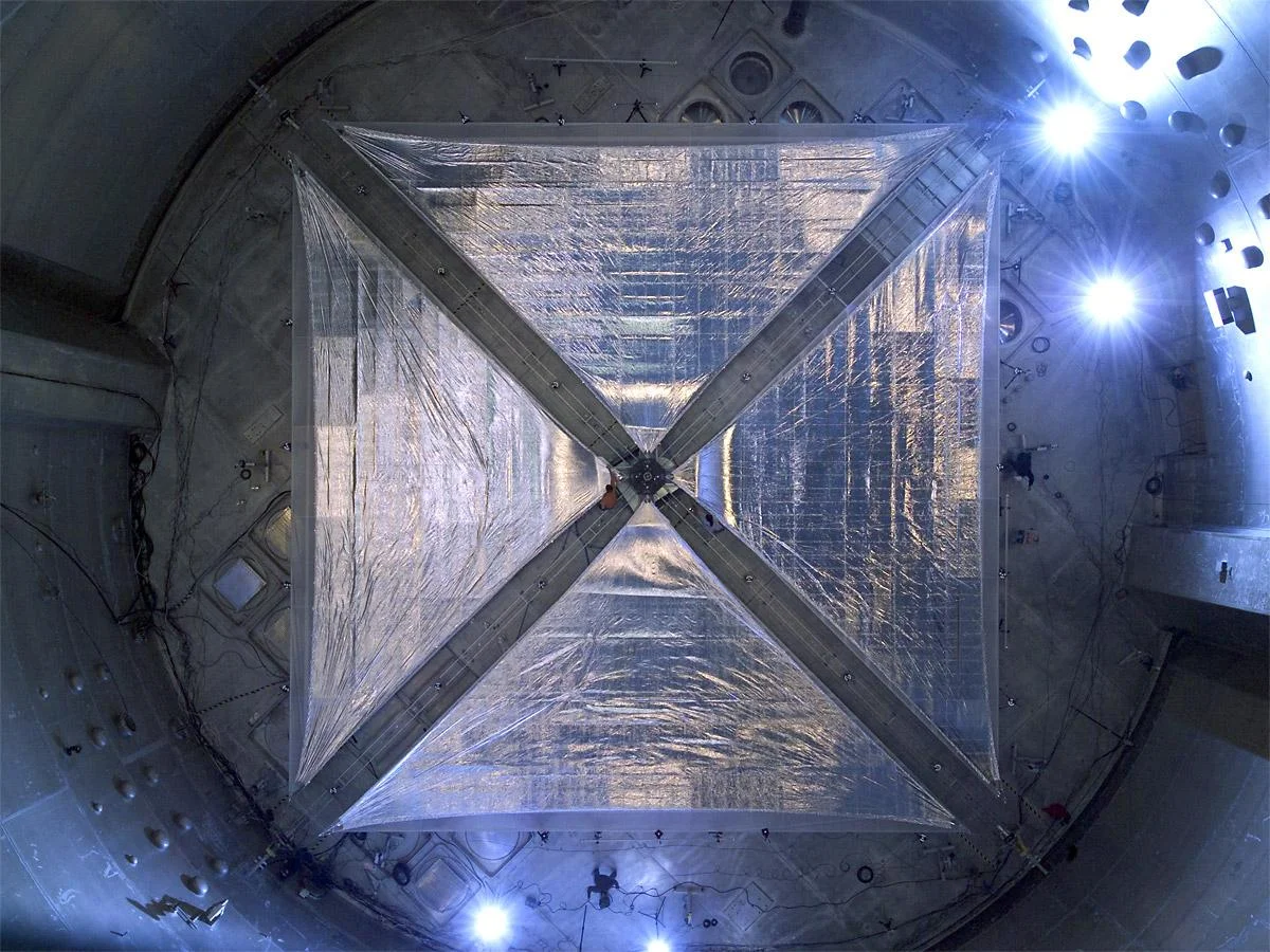 This image is of a four-quadrant solar sail system, measuring 66 feet on each side that was tested in 2005 in the world's largest vacuum chamber at NASA's Glenn Research Center at Plum Brook Station in Sandusky, Ohio. Image Credit: NASA