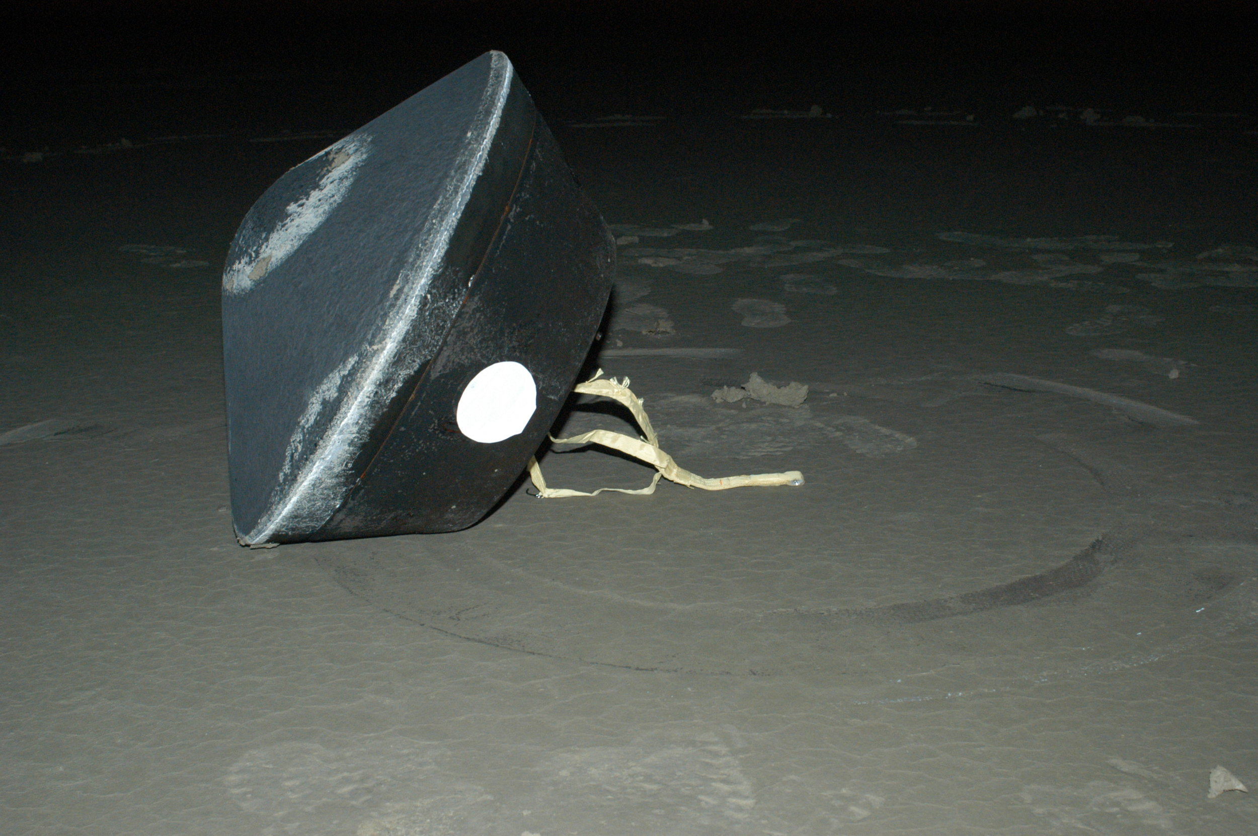 NASA's Stardust sample return capsule successfully landed at the U.S. Air Force Utah Test and Training Range at 2:10 a.m. Pacific time (3:10 a.m. Mountain time). The capsule contains cometary and interstellar samples gathered by the Stardust spacecraft. Image credit: NASA