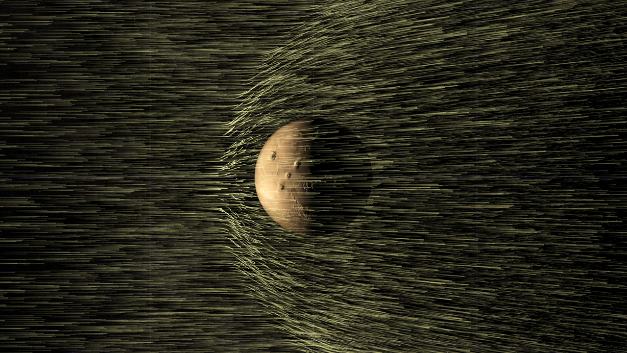 The solar wind is a stream of particles, mainly protons and electrons, flowing from the sun's atmosphere at a speed of about 1 million mph. Image credit: NASA's Scientific Visualization Studio and the MAVEN Science Team