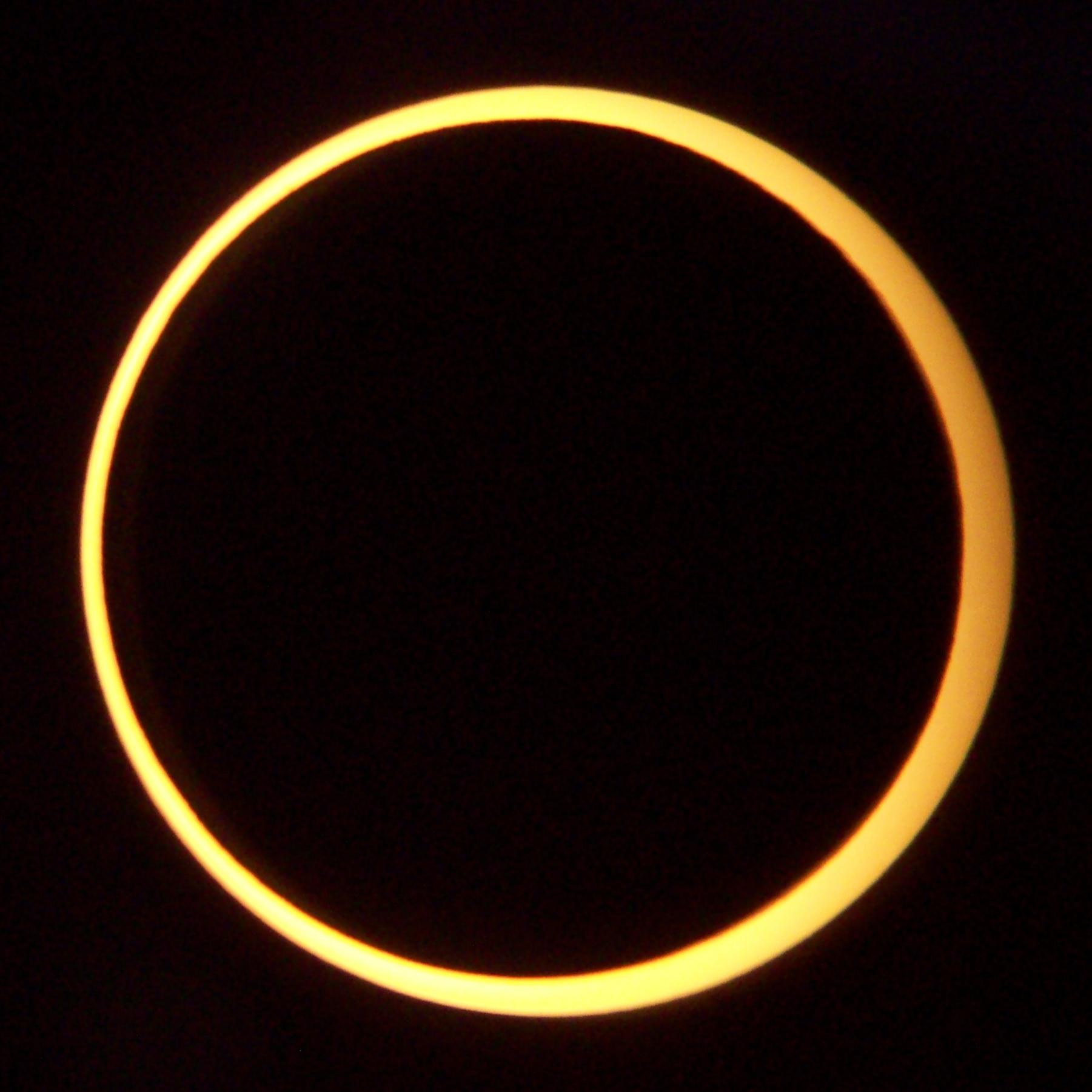 Annular eclipse. Taken from a 8" Reflector with a solar filter. Image credit: wikimedia user Smrgeog, CC BY SA 3.0