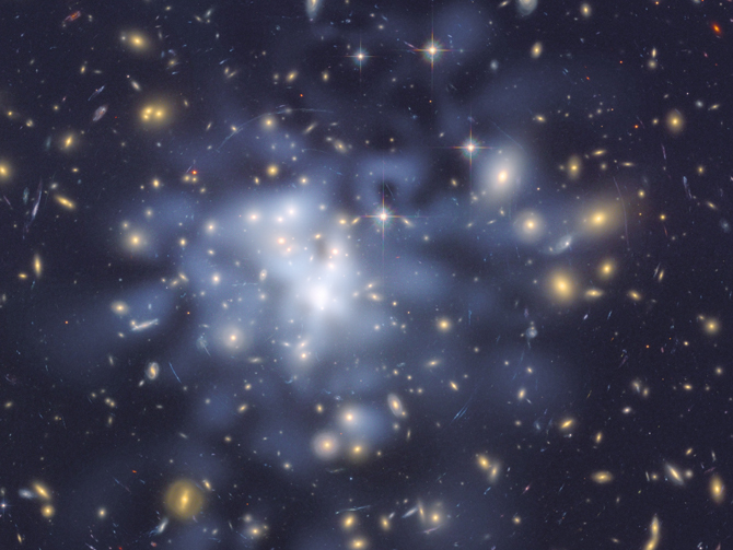 Astronomers using NASA's Hubble Space Telescope took advantage of a giant cosmic magnifying glass to create a detailed map of dark matter in the universe. Image credit: NASA, ESA, and D. Coe (NASA JPL/Caltech and STScI)