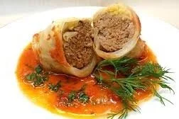 Golubtsi Beef & rice stuffed cabbage roll in tomato sauce.