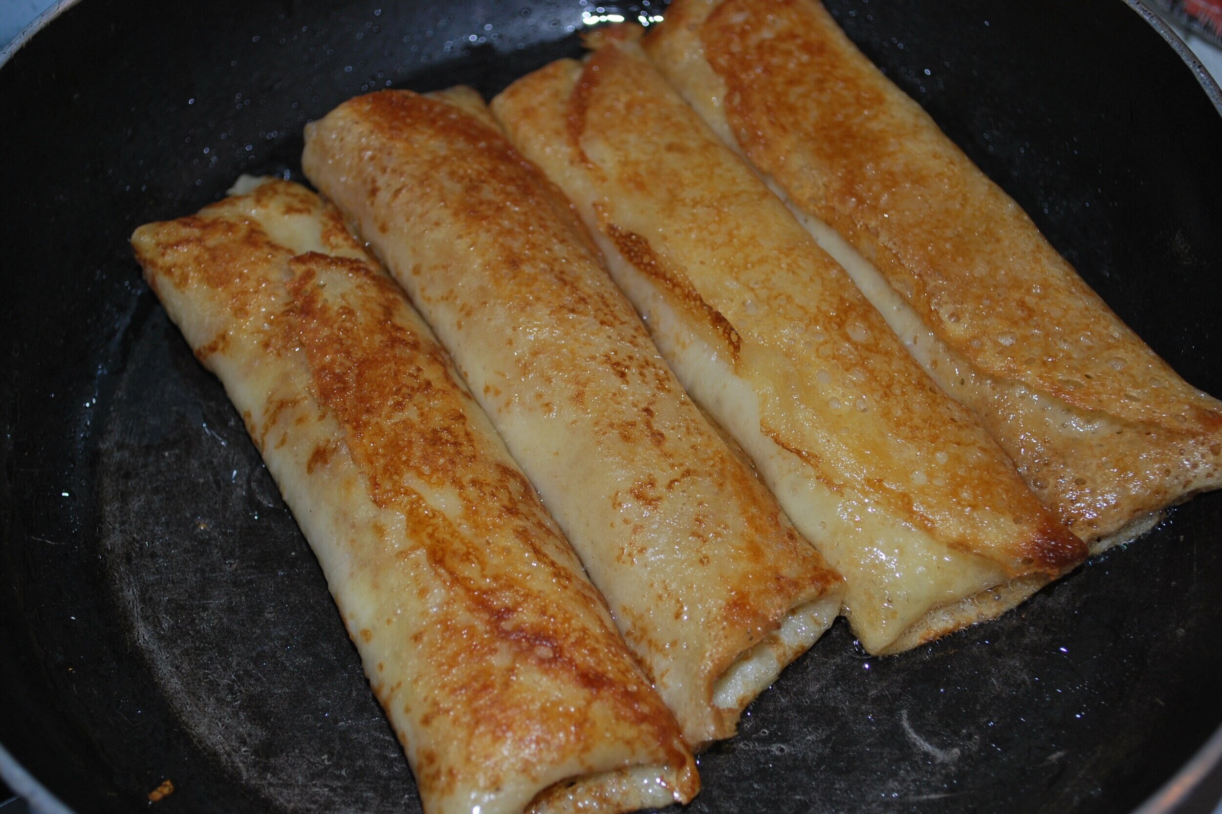 Stuffed Blinchiki Blini stuffed with cheese.