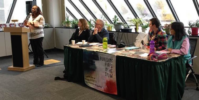 Shelby Wilson reads at the UAA Campus Bookstore while Martha Amore, Lucian Childs, Susanna Mishler and Mei Mei Evan look on. Photo by Sandra Kleven.