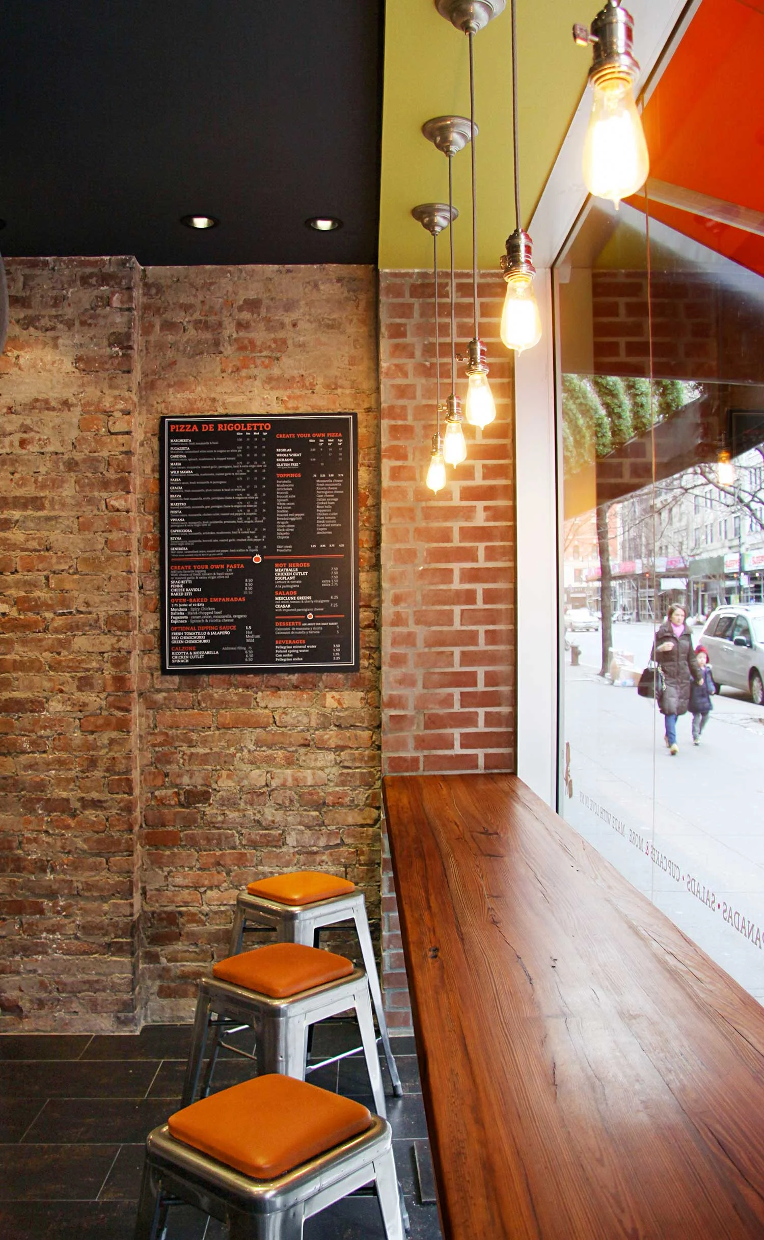 For this eatery on 72nd Street between Columbus Avenue and Broadway, we designed and renovated a run-down shell into a hip contemporary industrial venue to express our client's entrepreneurial and culinary vision. The aesthetic tastefully configures raw materials such as reclaimed heart pine, brick, and metals into a durable backdrop for casual dining. From concept to completion, from design to development, we guided each aspect of the project with a care and attention equal to that of the most highly decorated chef.
