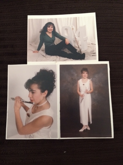 The Guardado that's afraid of the ball, posing with her Big Hair & flute, 1994