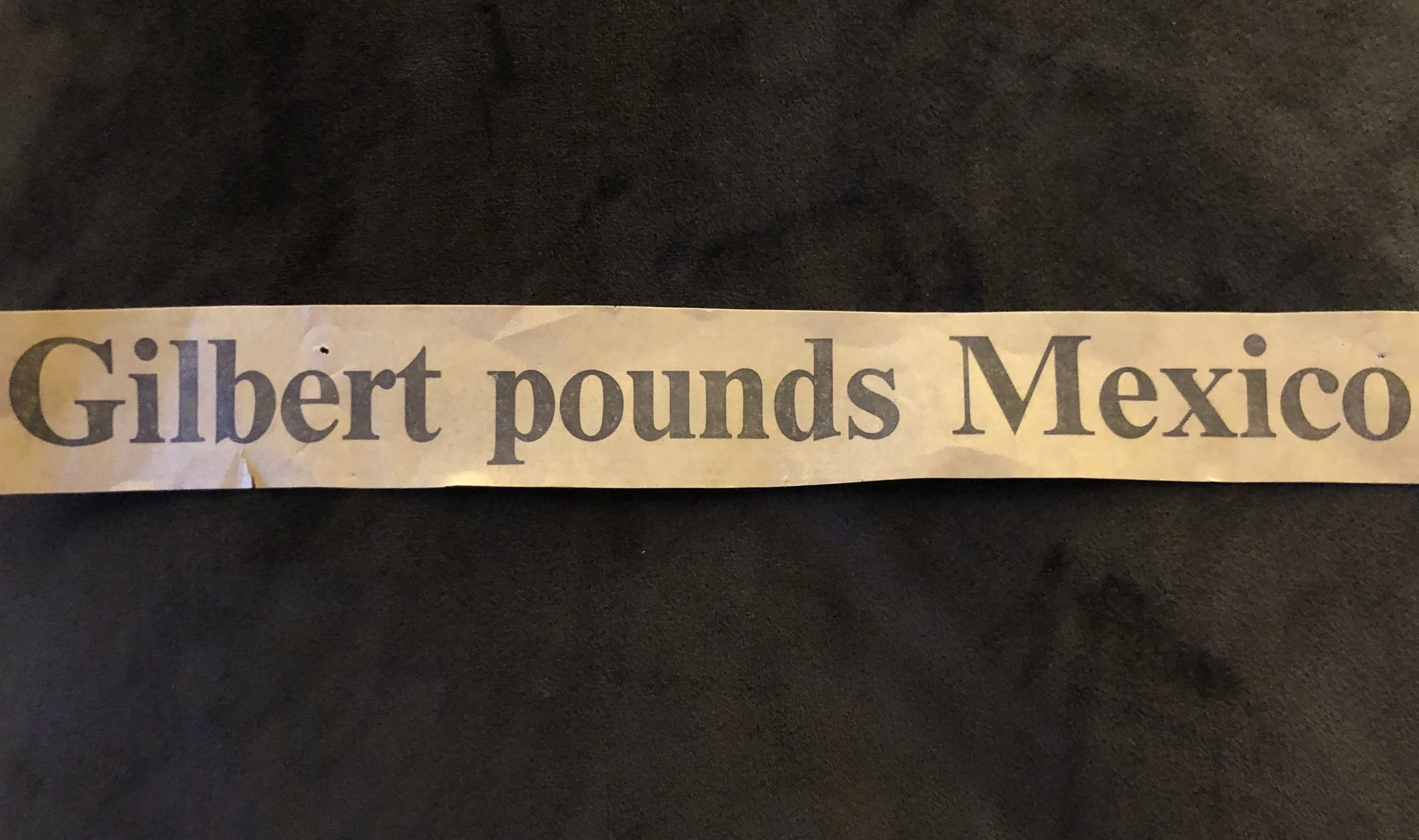 A headline hanging in Gilbert’s tool shed.