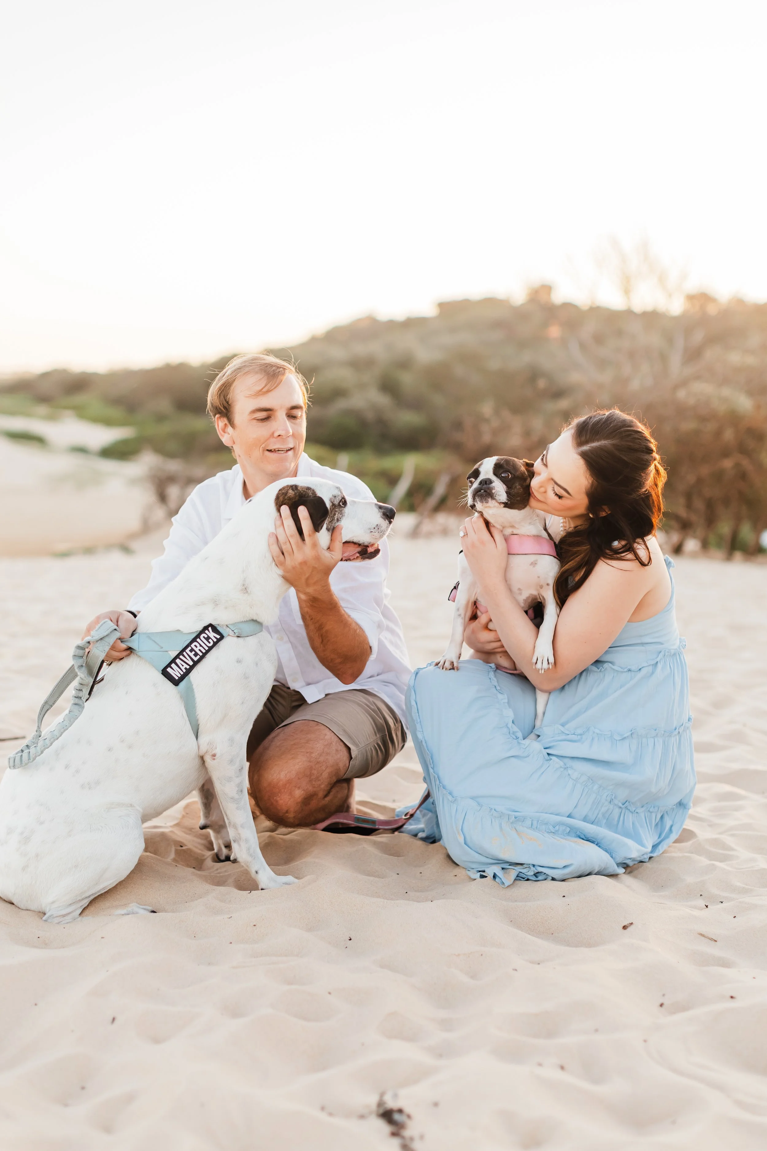 engagement photos with dogs at the beach