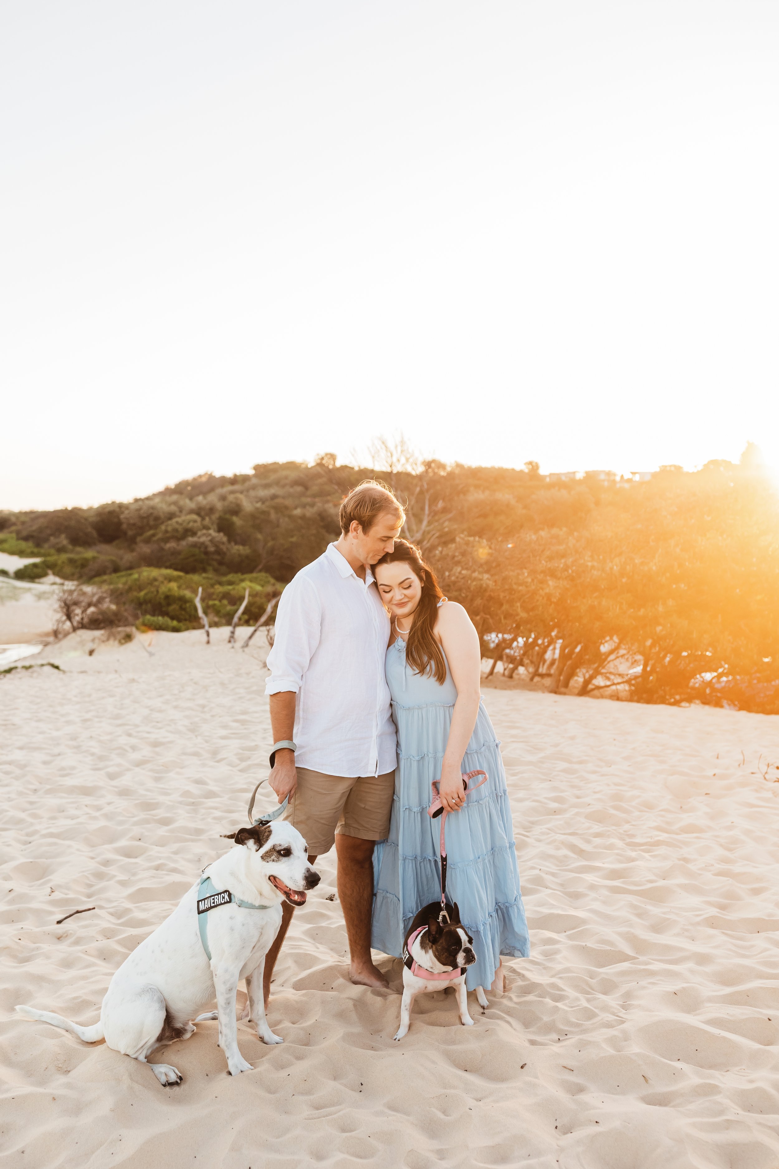 engagement photos with dogs at the beach