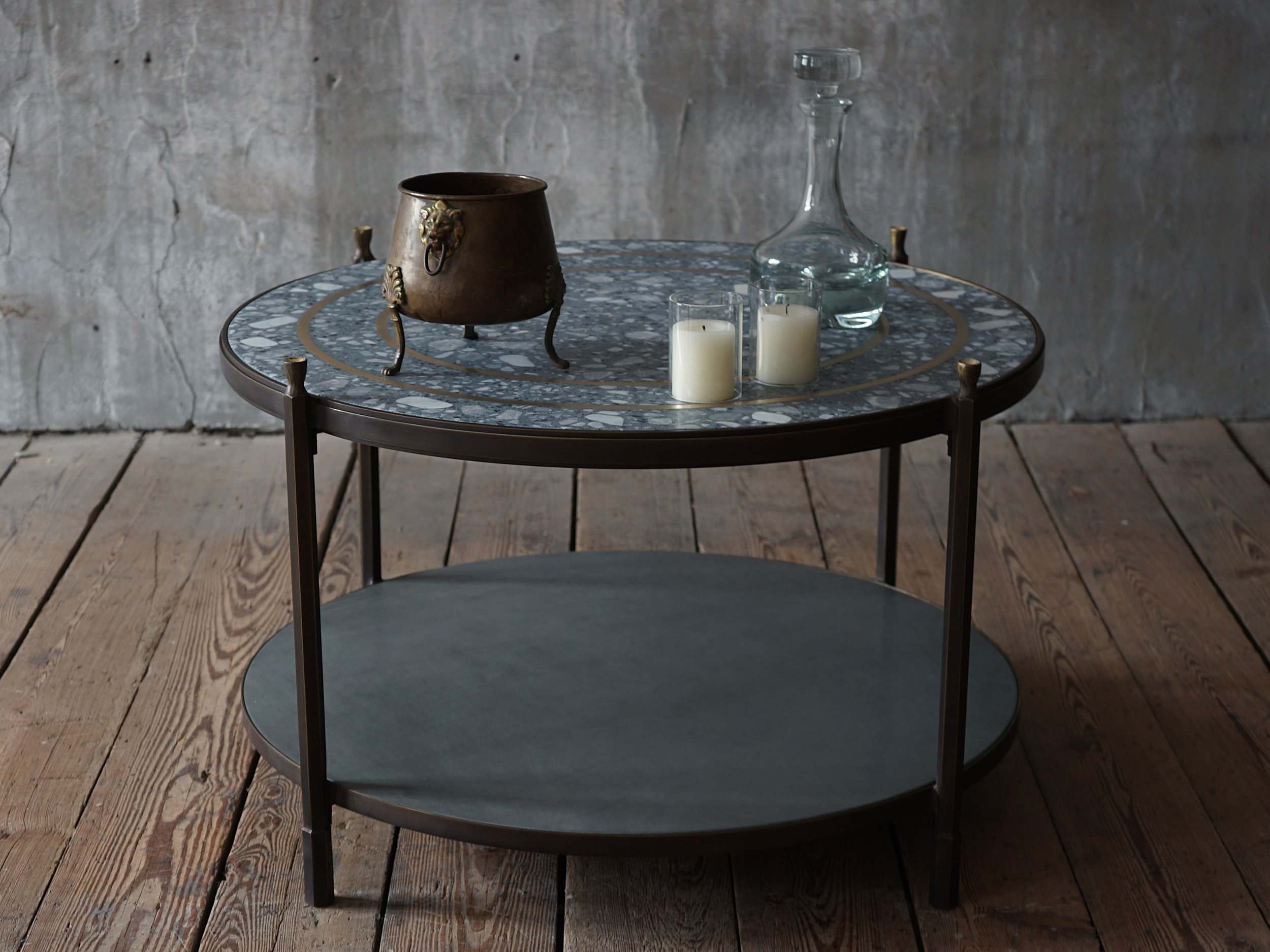 Brass table with custom terrazzo top.