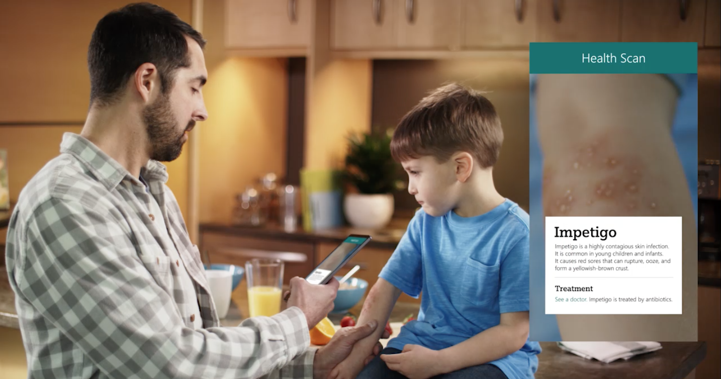 Intro montage: Dad uses a medical app to scan his child's ailment to get info and medical assistance.