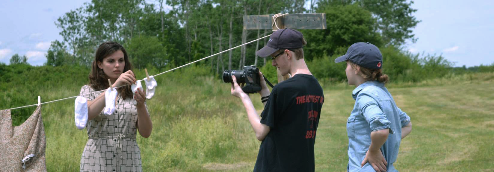 Working with cinematographer David Chatterton and actress E.J. Kanter on the set of "Radio."