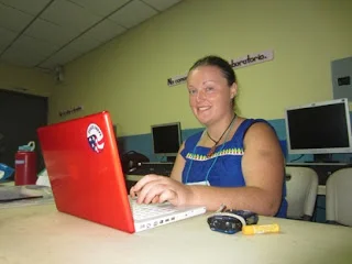 Amber rocks a nagua (the indigenous dress) while updating the blog!