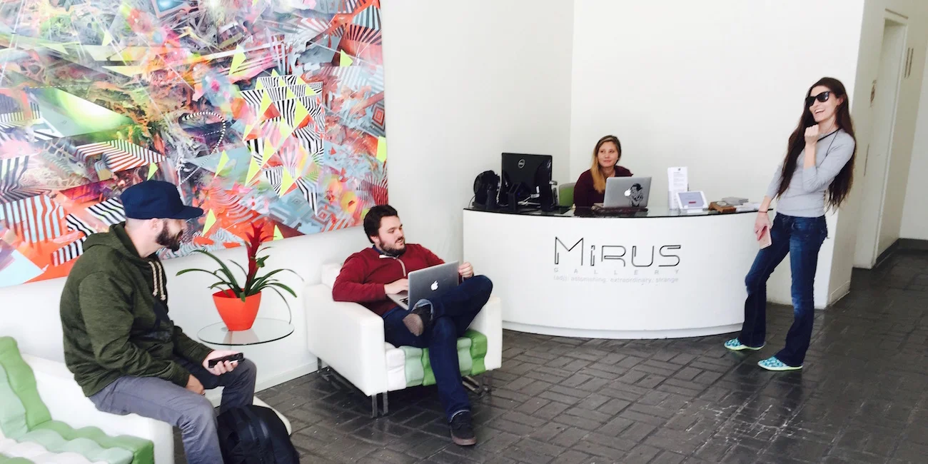 Work in a modern space surrounded by art at Eco-Systm.