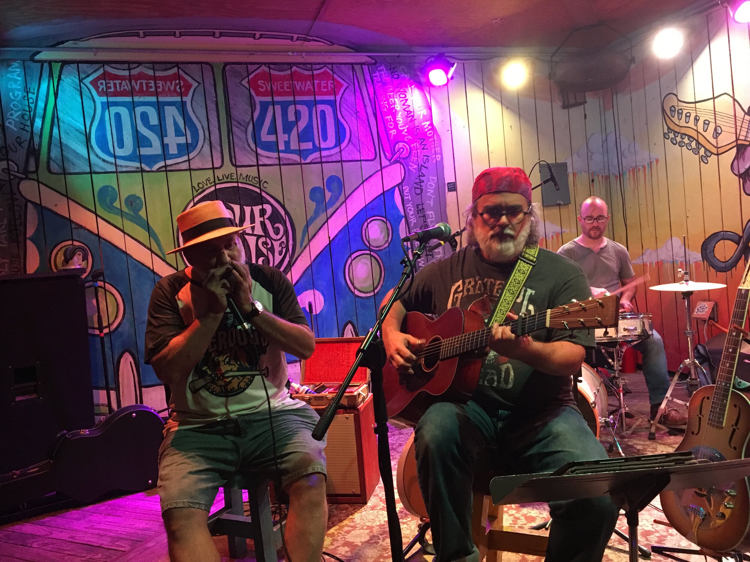 Mr. Charlie plays on the deck at The Pour House