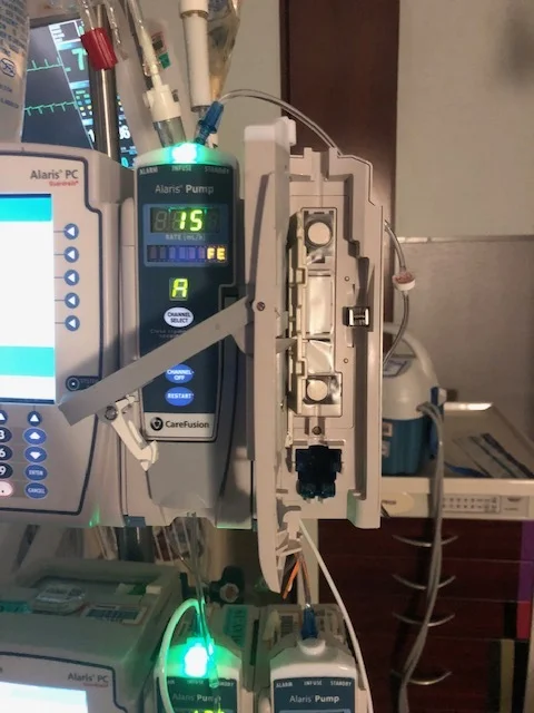 An open channel where you place the IV tubing