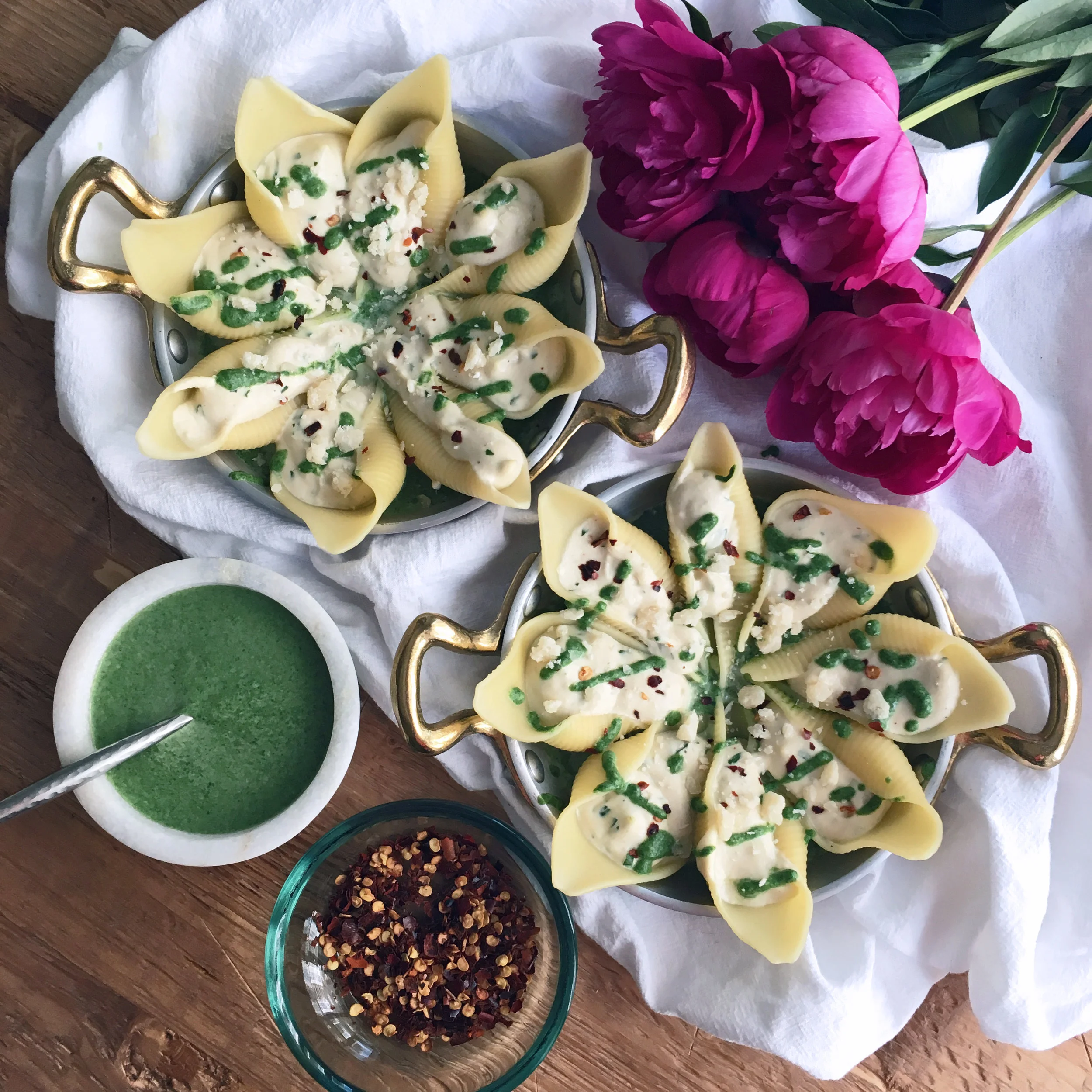 Cashew Cream Stuffed Shells with Roasted Garlic Spinach Cream Sauce