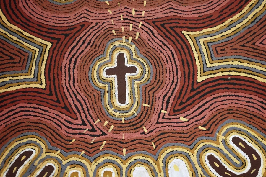 Pictured: A beautiful expression of the the Cross in traditional Aboriginal art on display at the Kidman Street Church, Alice Springs.