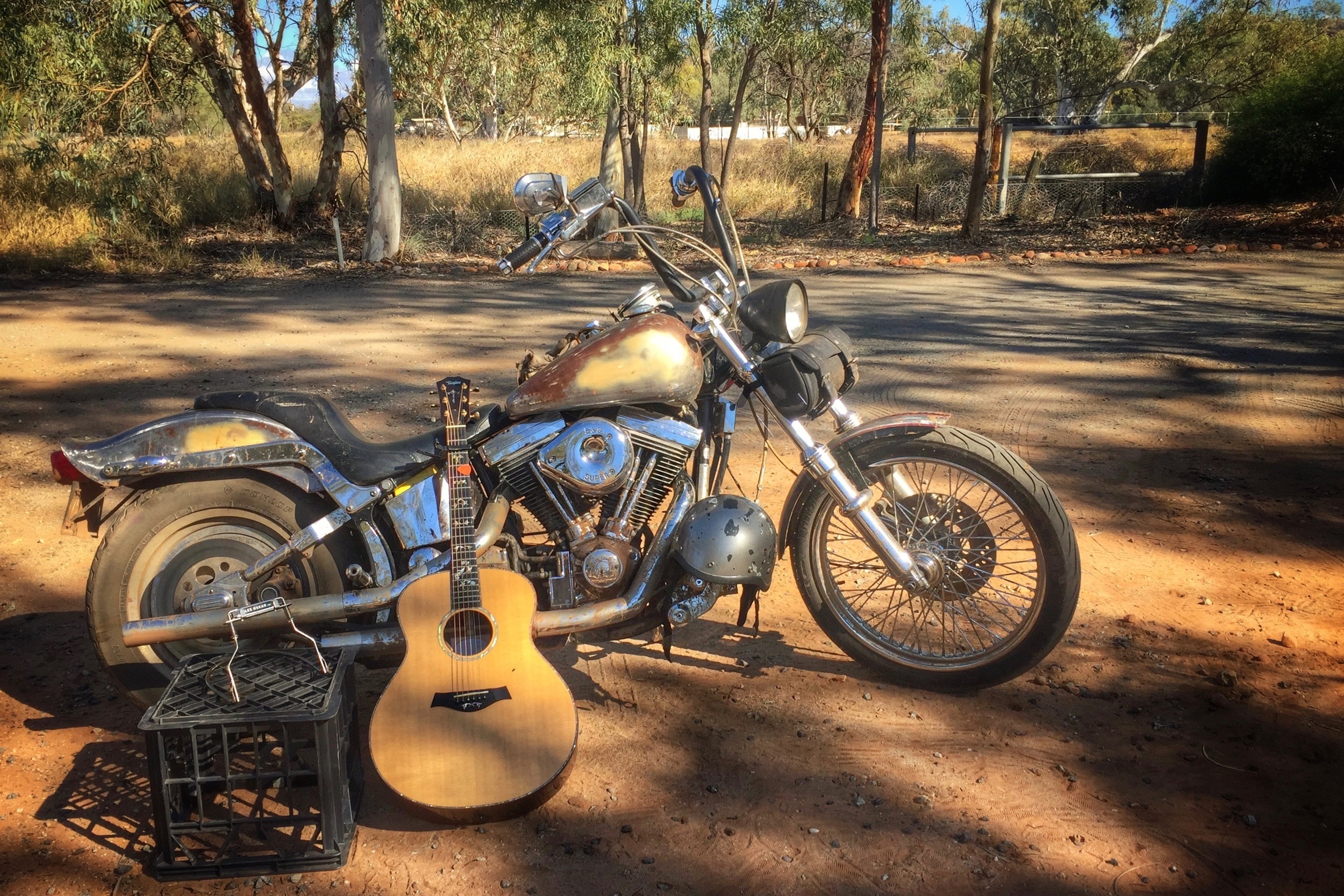 Pictured: The old Harley with Taylor Guitar after a short film shoot.